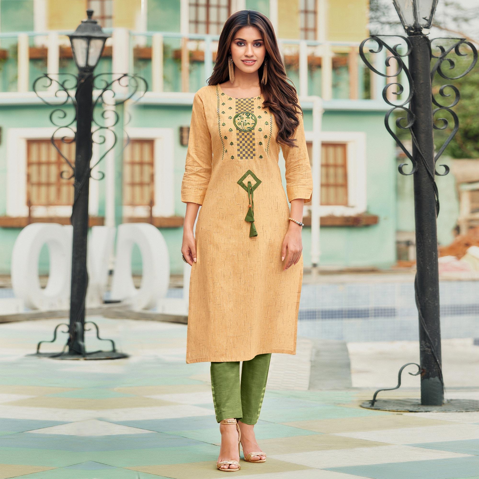 Capricious Yellowish Beige Colored Casual Wear Embroidered Heavy Pure Cotton Kurti - Peachmode
