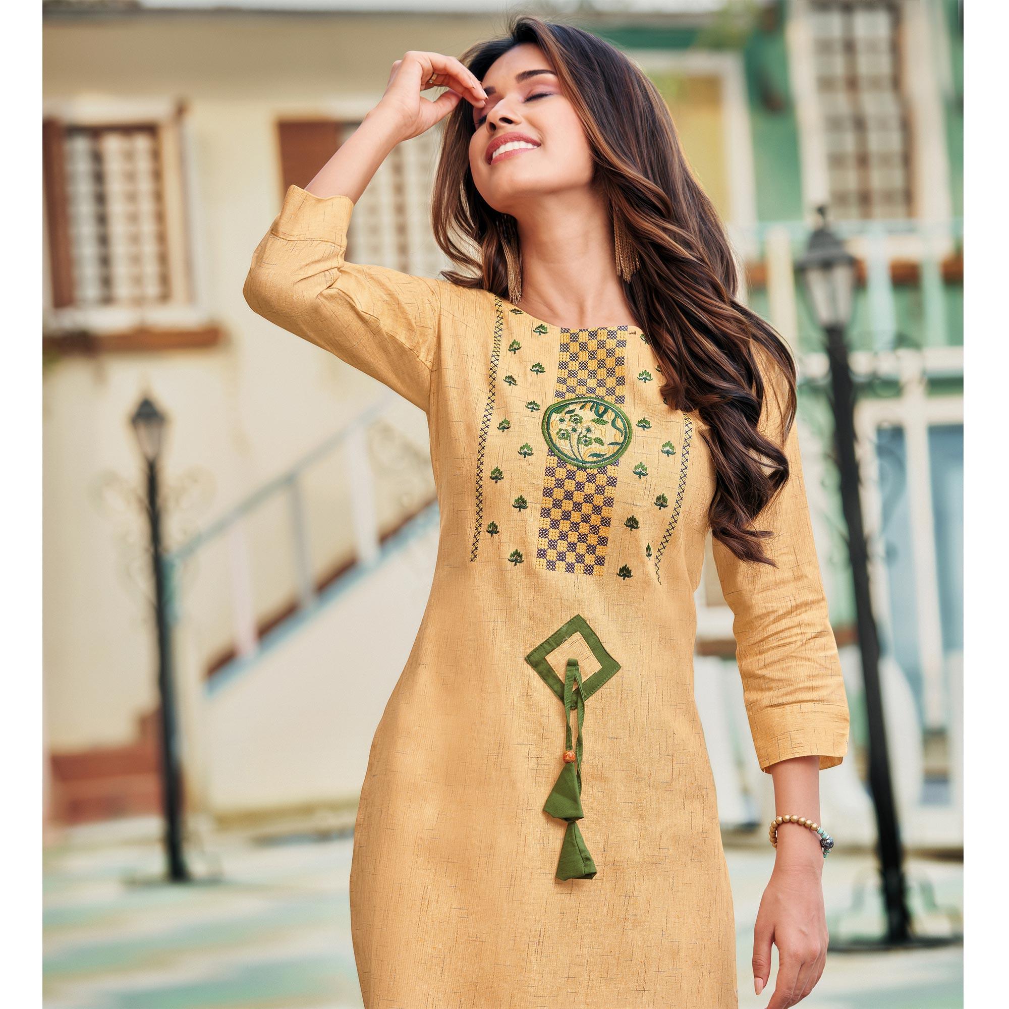 Capricious Yellowish Beige Colored Casual Wear Embroidered Heavy Pure Cotton Kurti - Peachmode