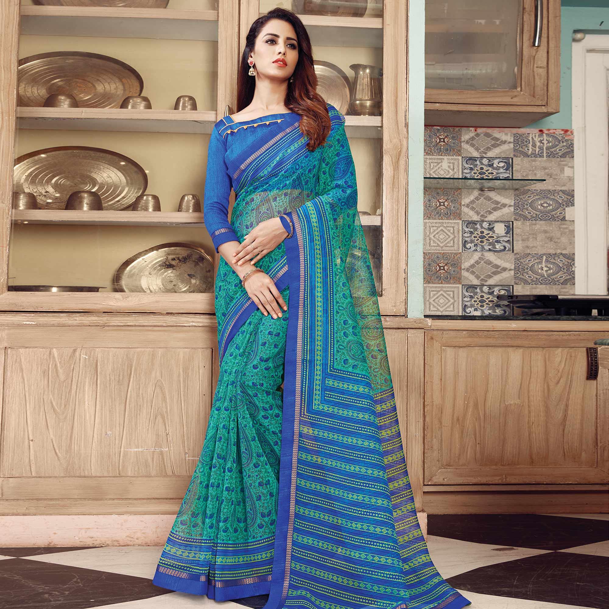 Captivating Turquoise Green Colored Partywear Printed Silk Saree - Peachmode