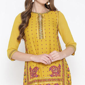 Charismatic Yellow Floral Printed Casual Wear Poly Muslin Kurti - Peachmode