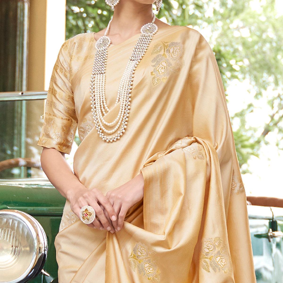 Charming Cream Colored Zari Work Festive Wear Banarasi Silk Saree - Peachmode