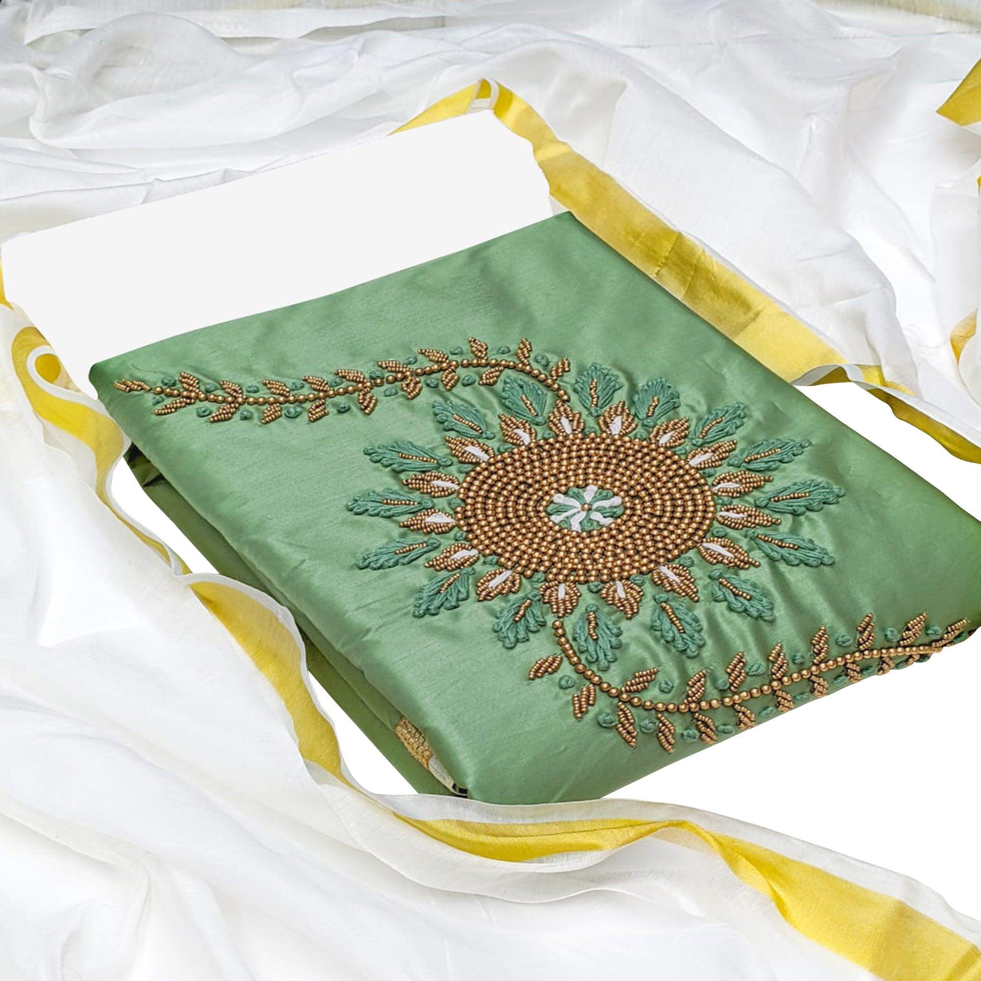 Charming Green Colored Casual Wear Embroidered Cotton Dress Material - Peachmode