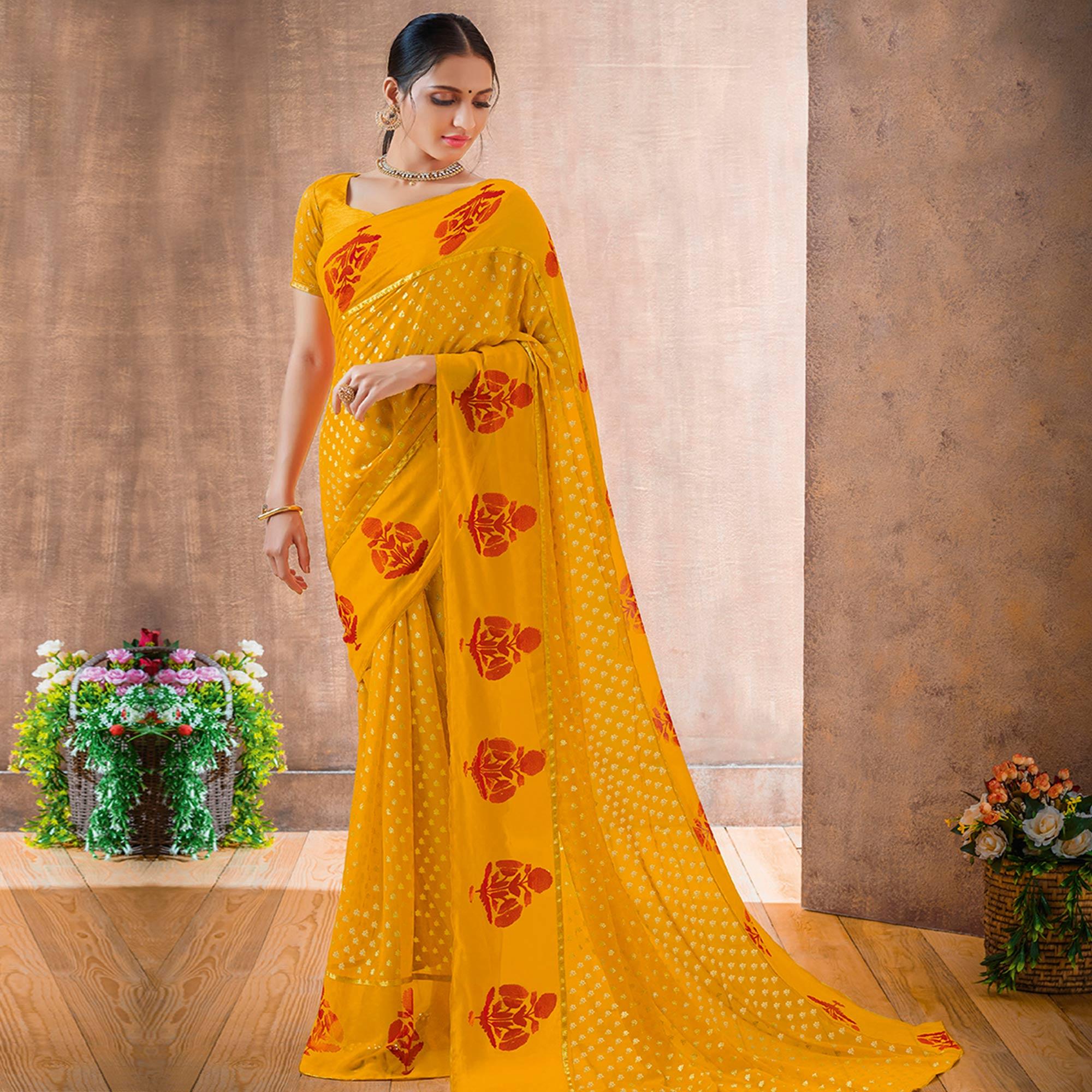 Charming Yellow Colored Festive Wear Foil Printed Georgette Saree - Peachmode