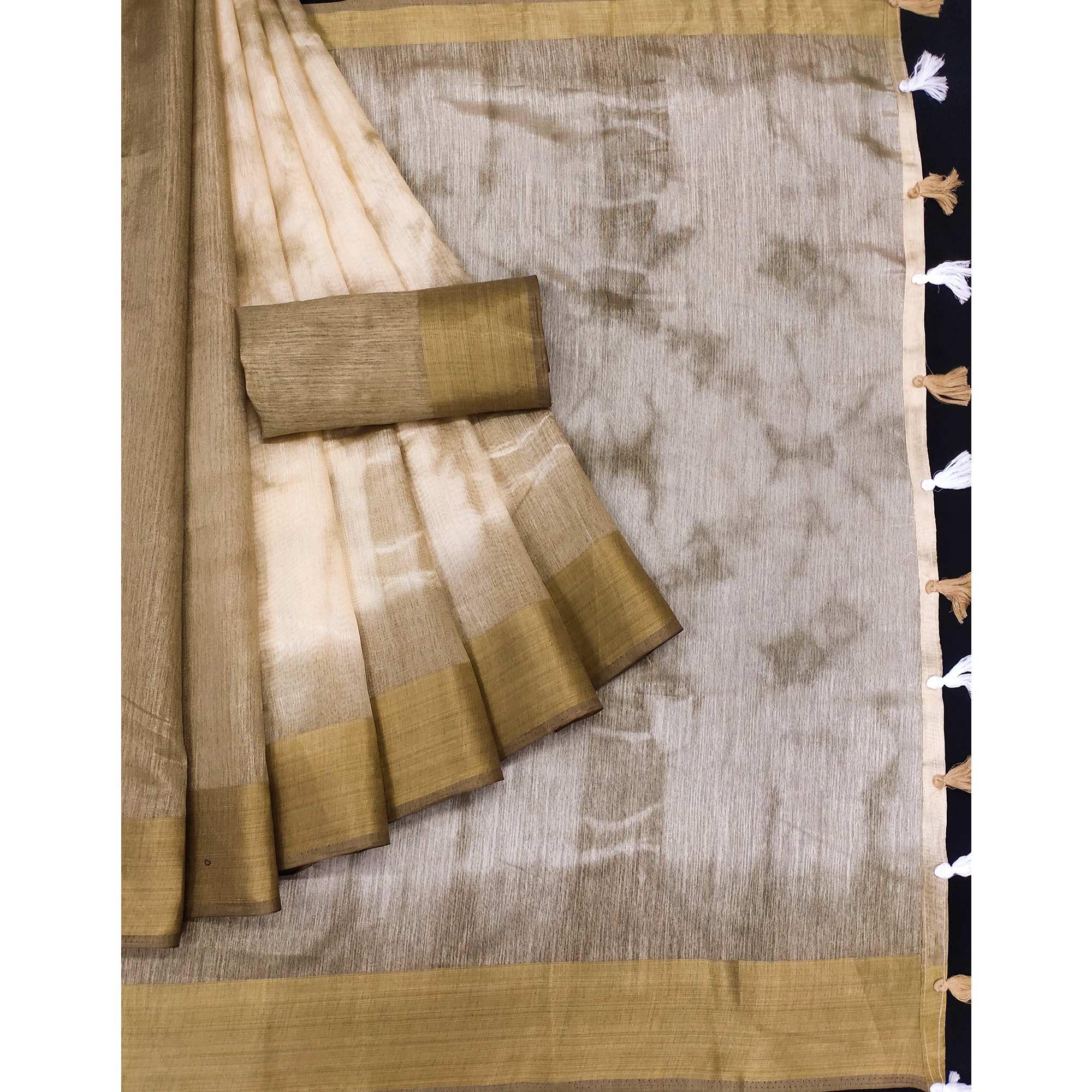 Chikoo Printed Poly Cotton Saree With Tassels - Peachmode