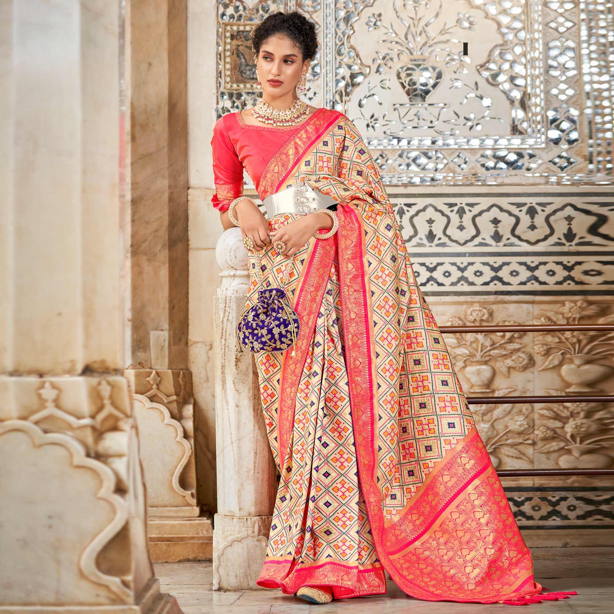 Chikoo Woven Art Silk Patola Saree With Tassels - Peachmode