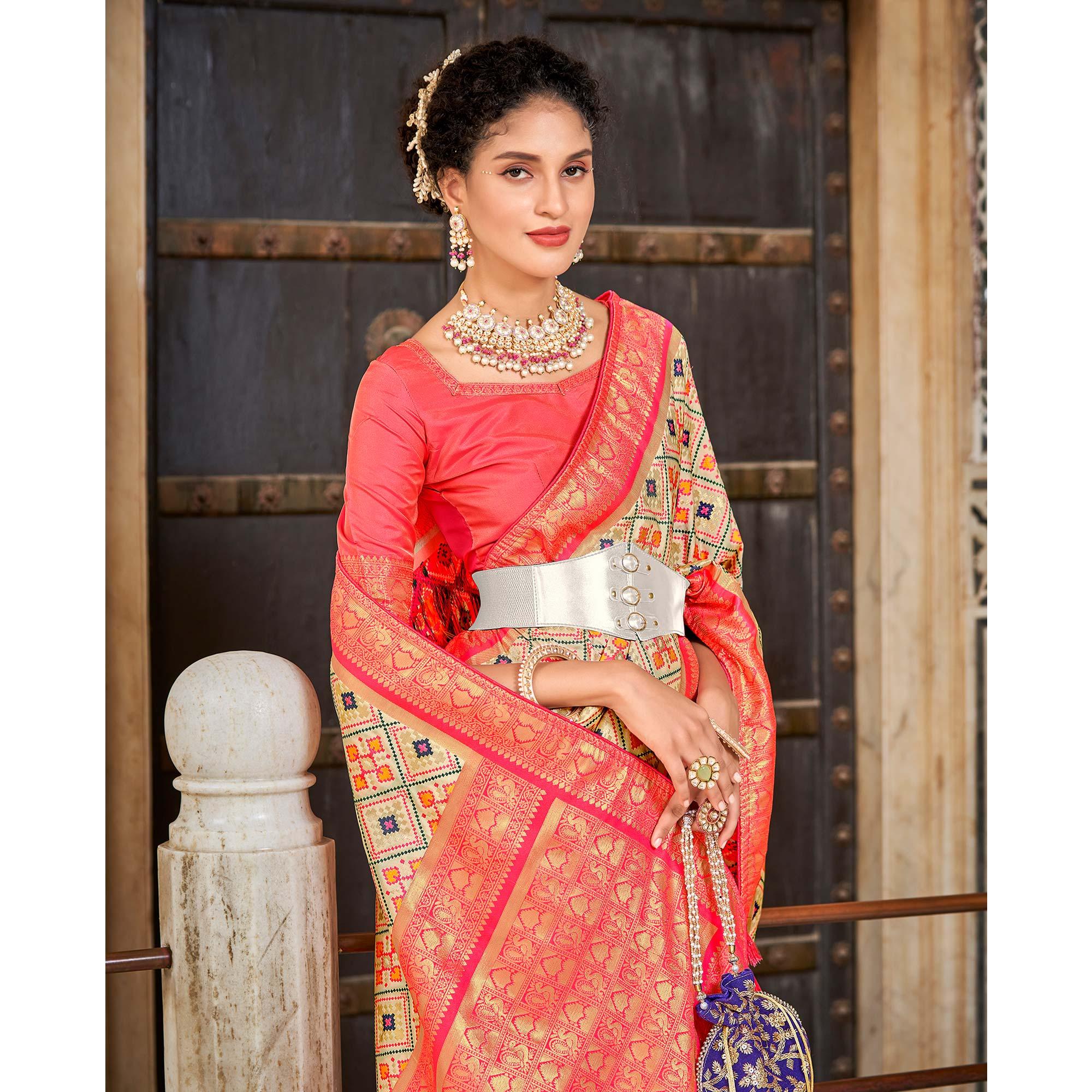 Chikoo Woven Art Silk Patola Saree With Tassels - Peachmode