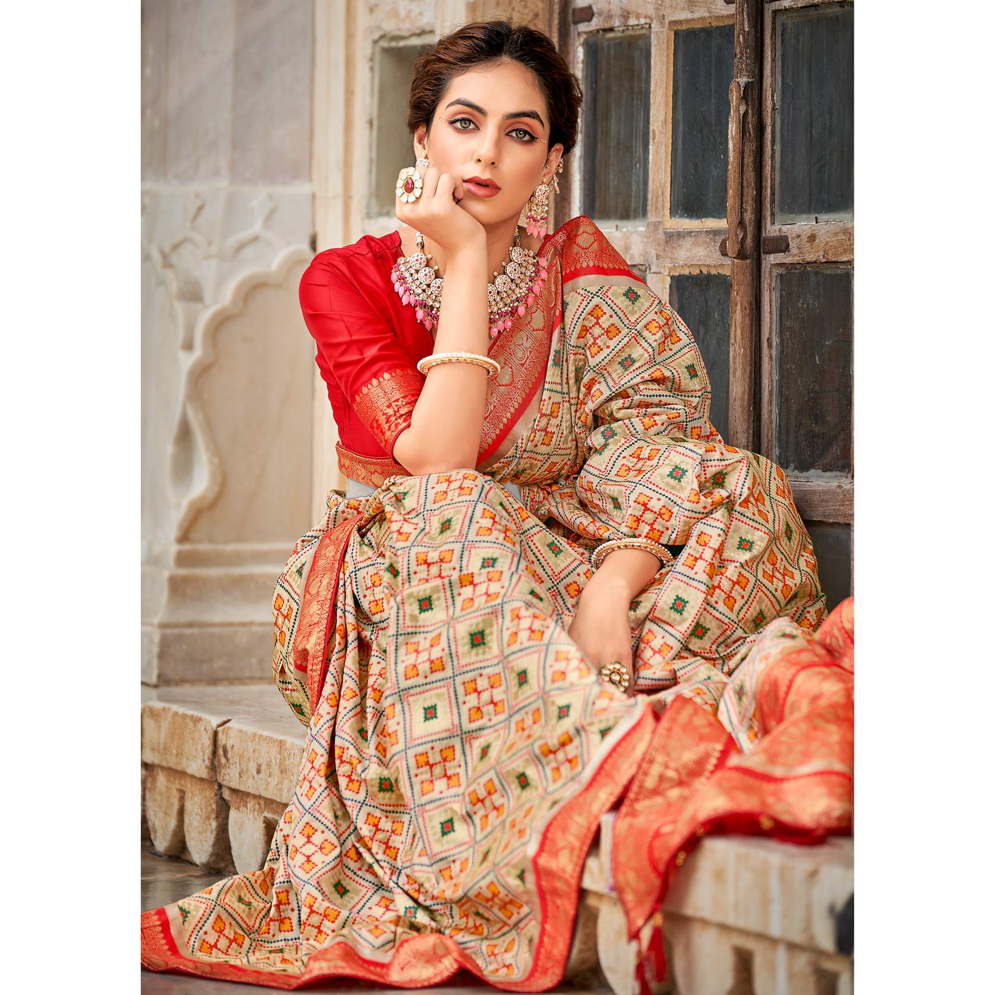 Chikoo Woven Art Silk Patola Saree With Tassels - Peachmode