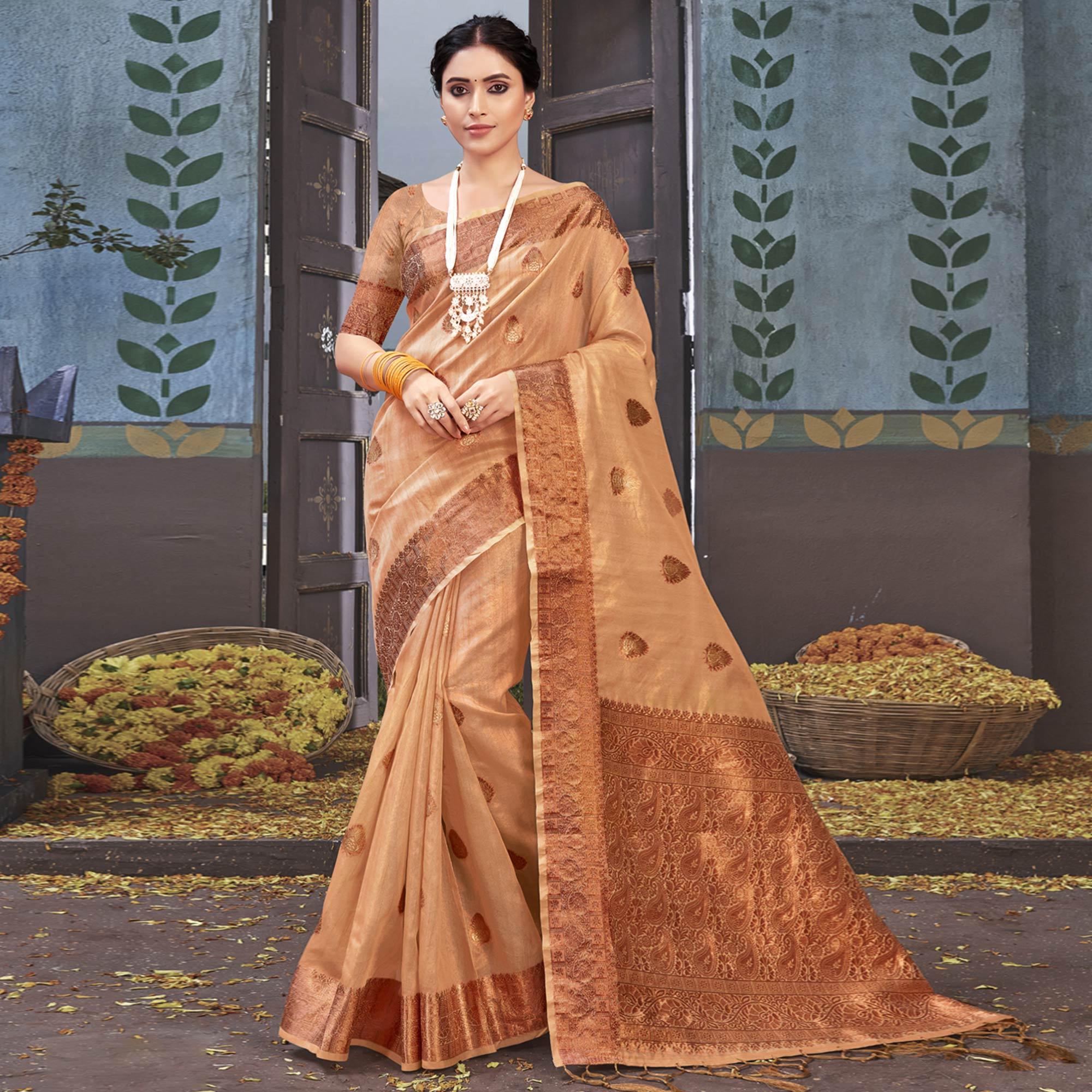 Chikoo Woven Organza Saree With Tassels - Peachmode