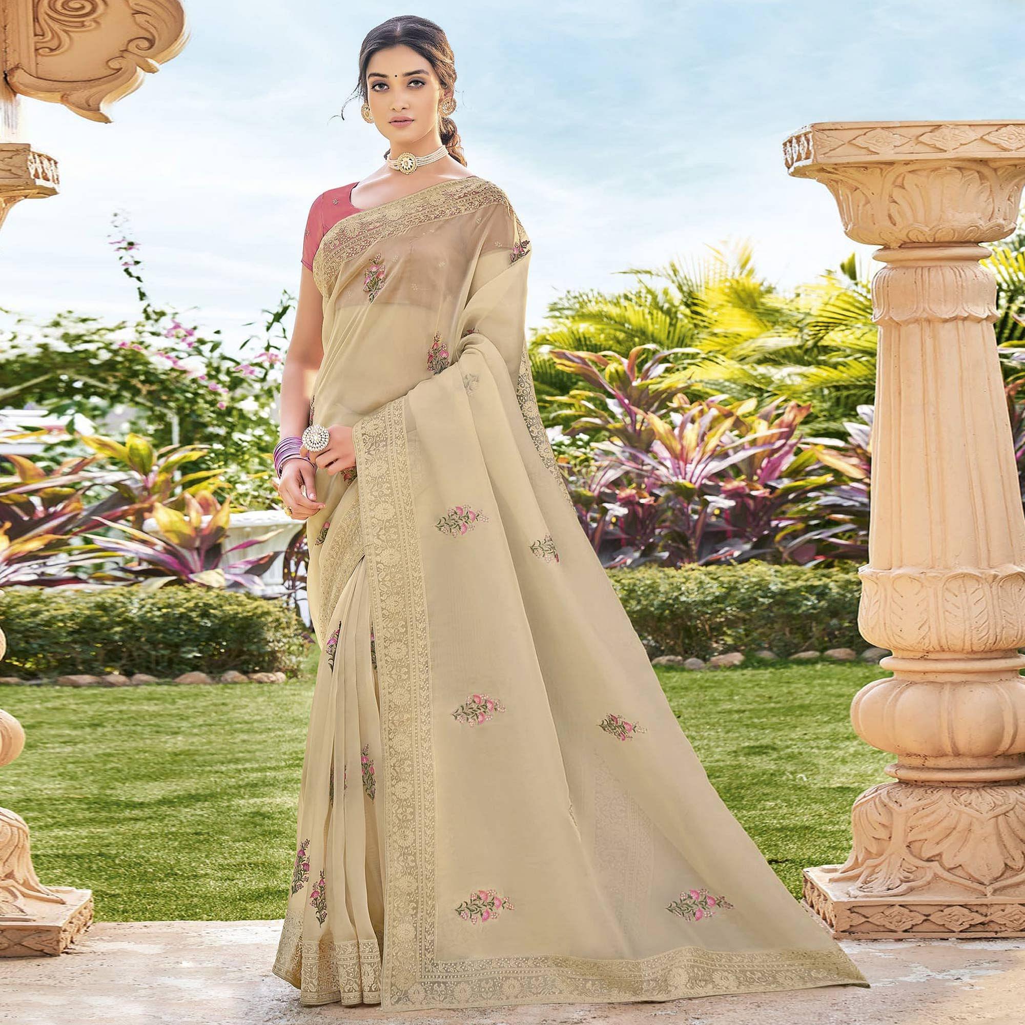 Chiku Embroidered Georgette Saree - Peachmode