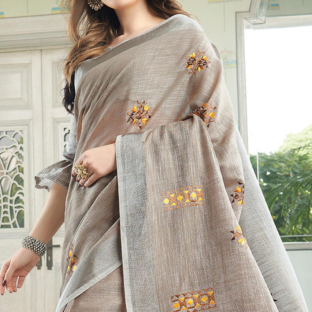 Classy Pastel Brown Colored Casual Wear Floral Embroidered Linen-Cotton Saree With Tassels - Peachmode