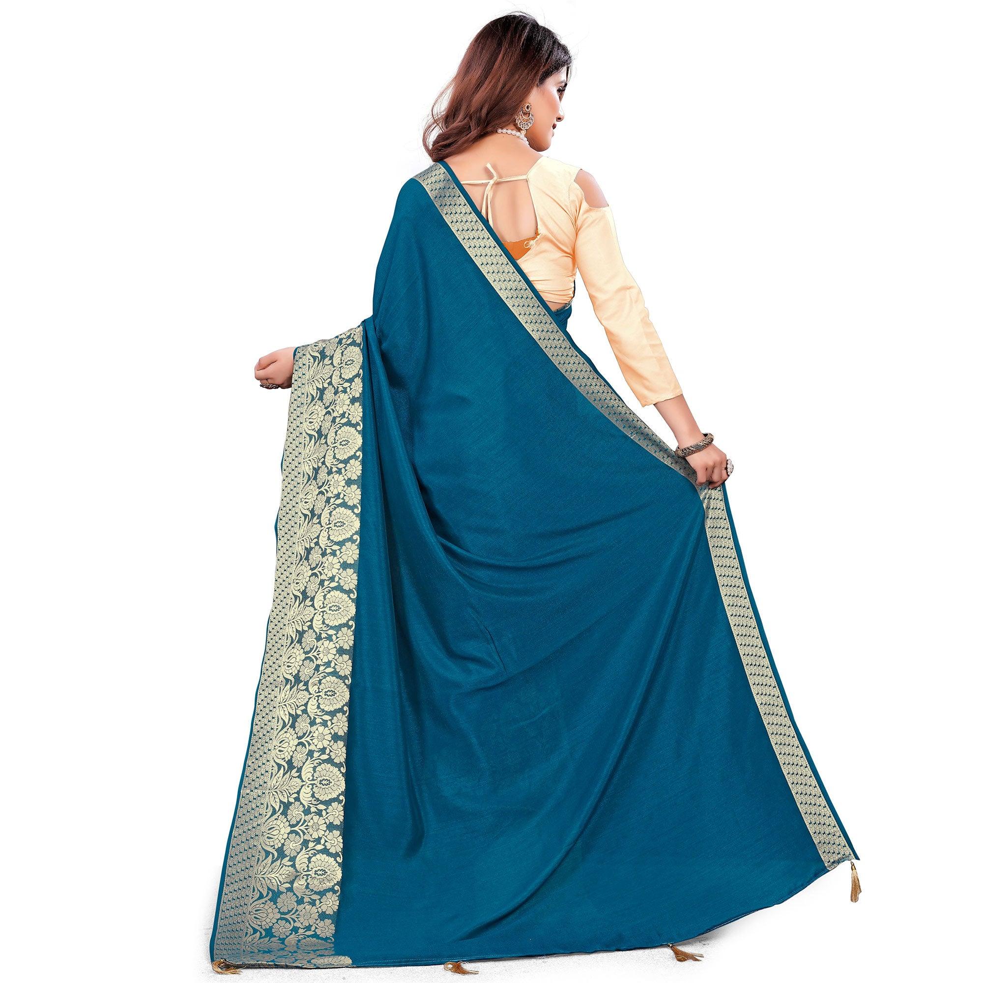 Classy Teal Blue Colored Festive Wear Woven Art Silk Saree With Tassels - Peachmode
