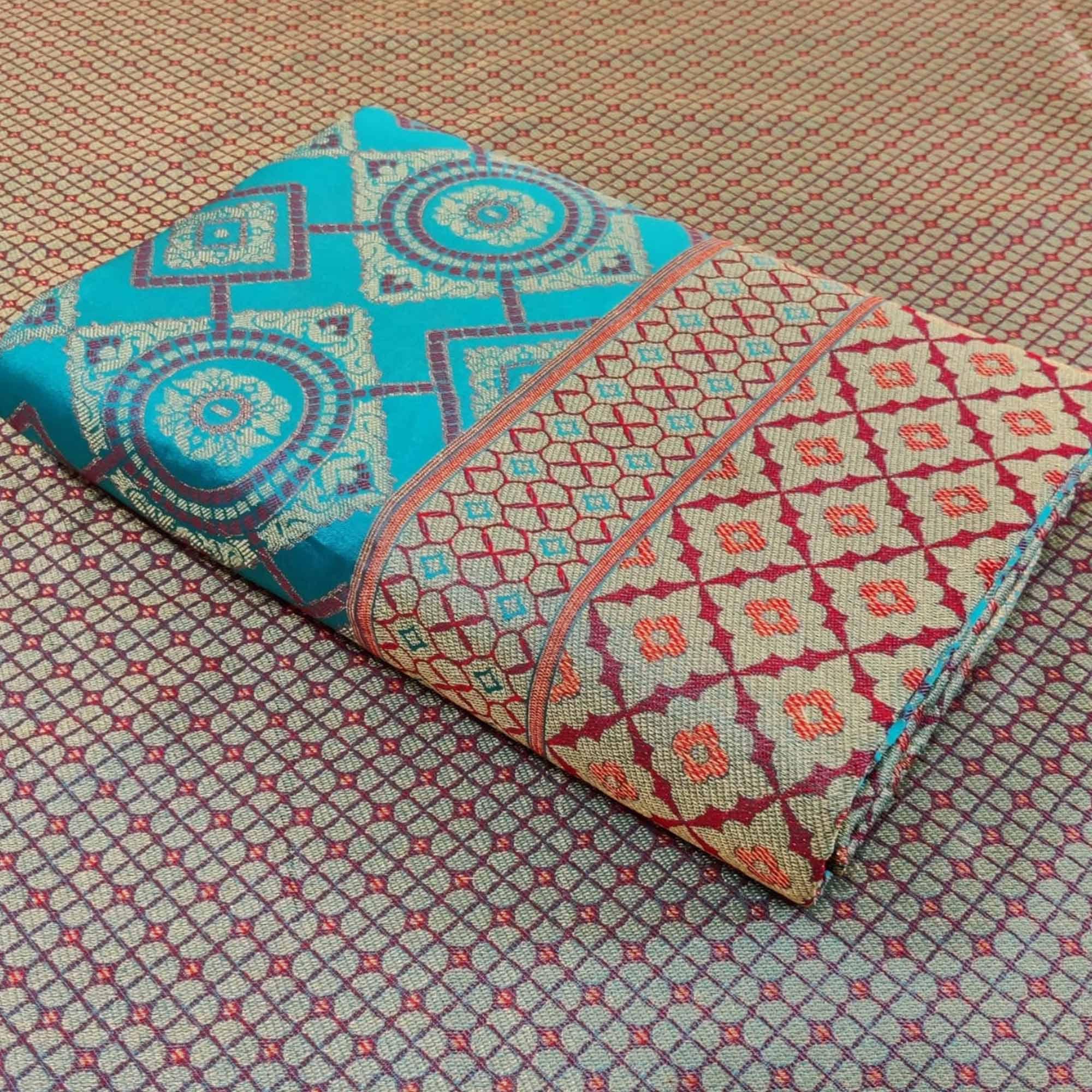 Classy Turquoise Blue Colored Festive Wear Woven Patola Silk Saree - Peachmode