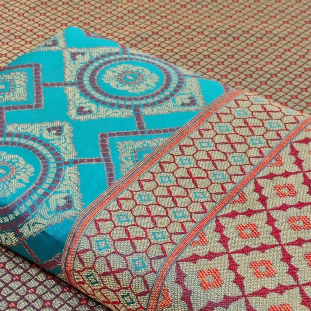 Classy Turquoise Blue Colored Festive Wear Woven Patola Silk Saree - Peachmode