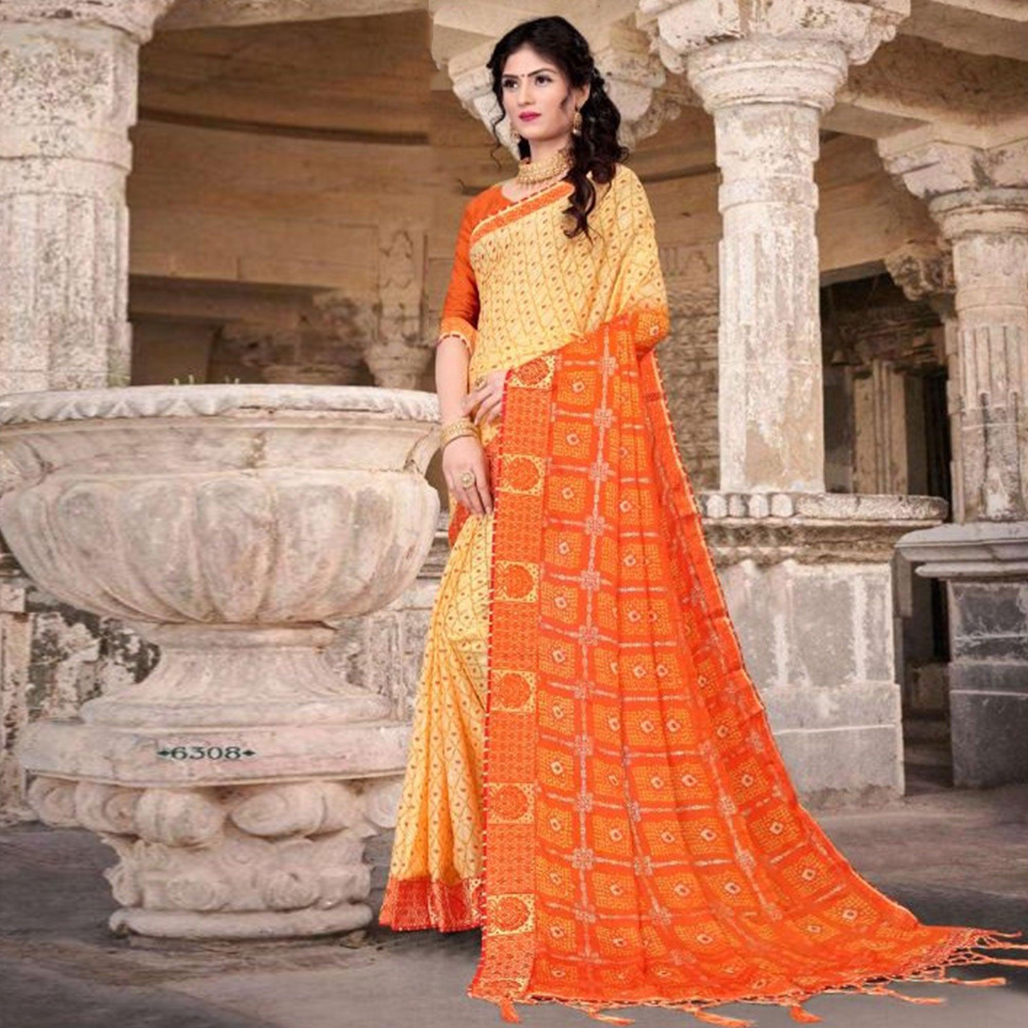 Cream & Orange Festive Wear Bandhani Printed Chiffon Saree With Diamond Border - Peachmode