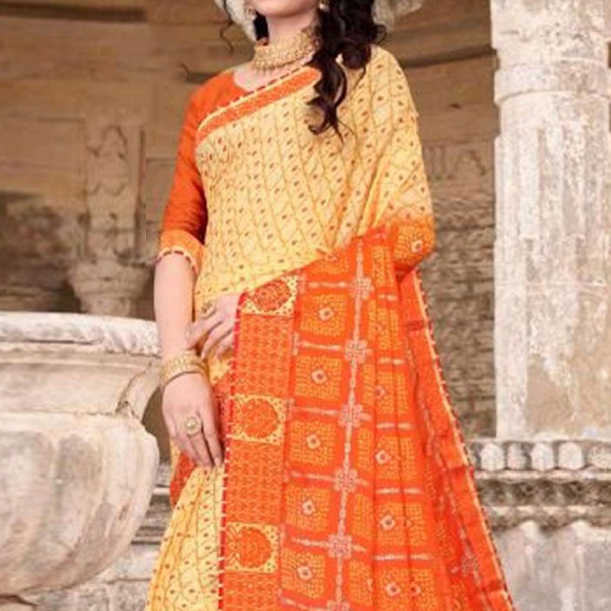 Cream & Orange Festive Wear Bandhani Printed Chiffon Saree With Diamond Border - Peachmode