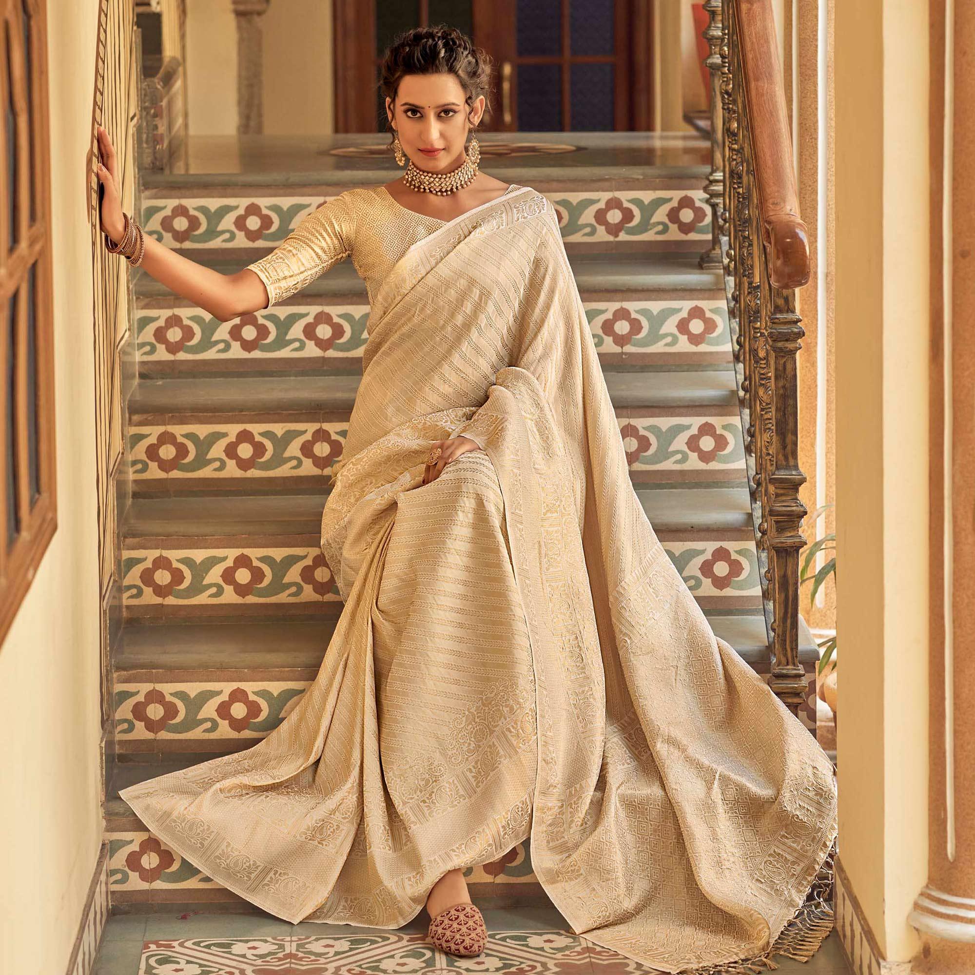 Cream Festive Wear Kanjivaram Blended Silk Saree With Tassels - Peachmode