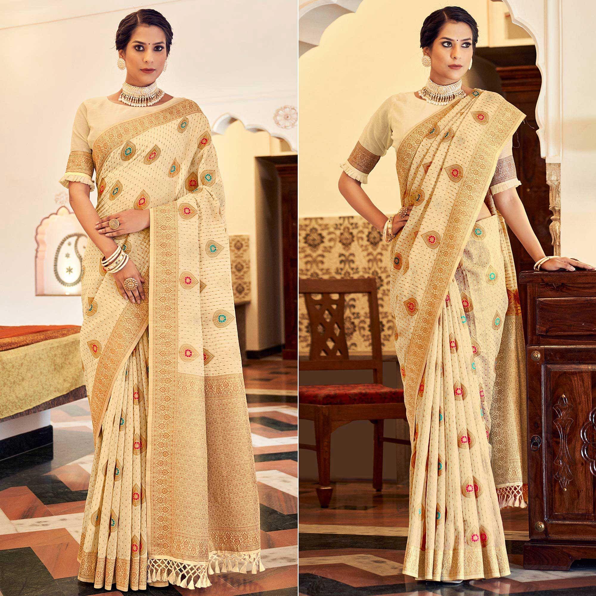 Cream Festive Wear Woven Banarasi Saree With Tassels - Peachmode