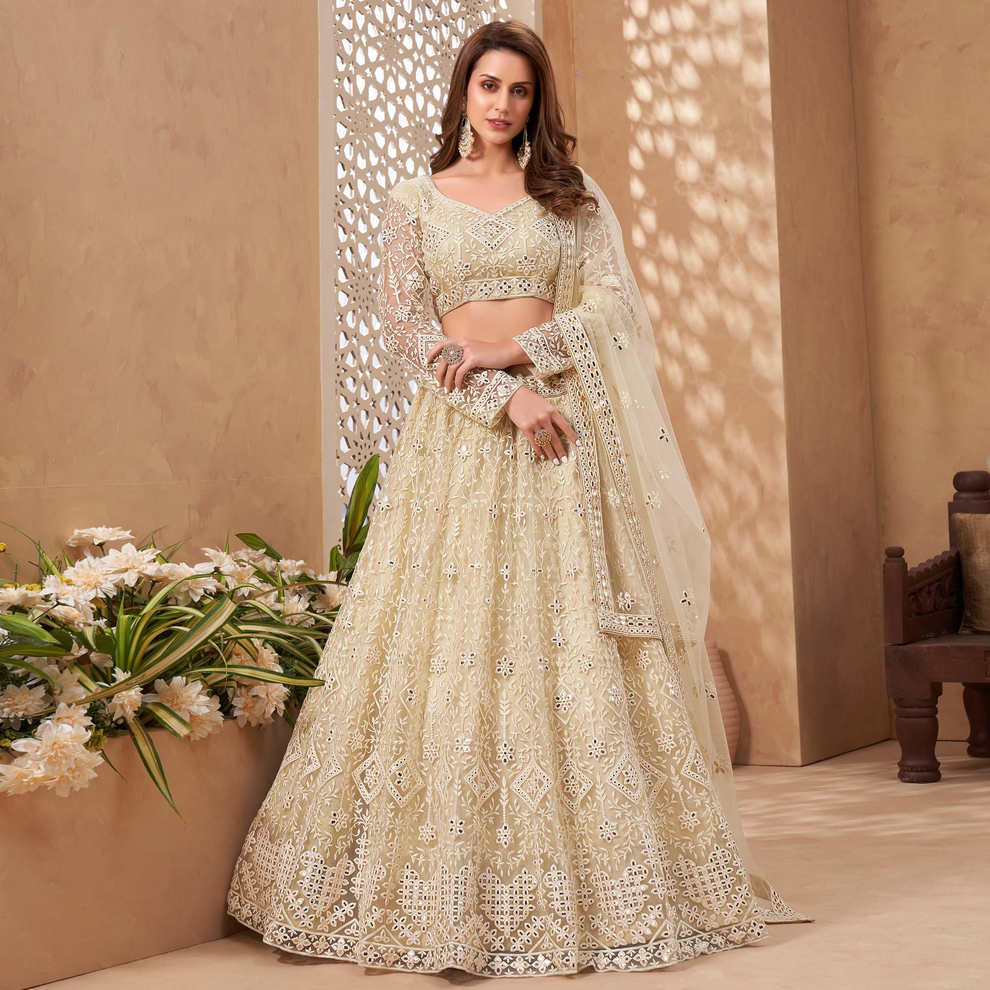 Cream Floral Embroidered Net Lehenga Choli - Peachmode