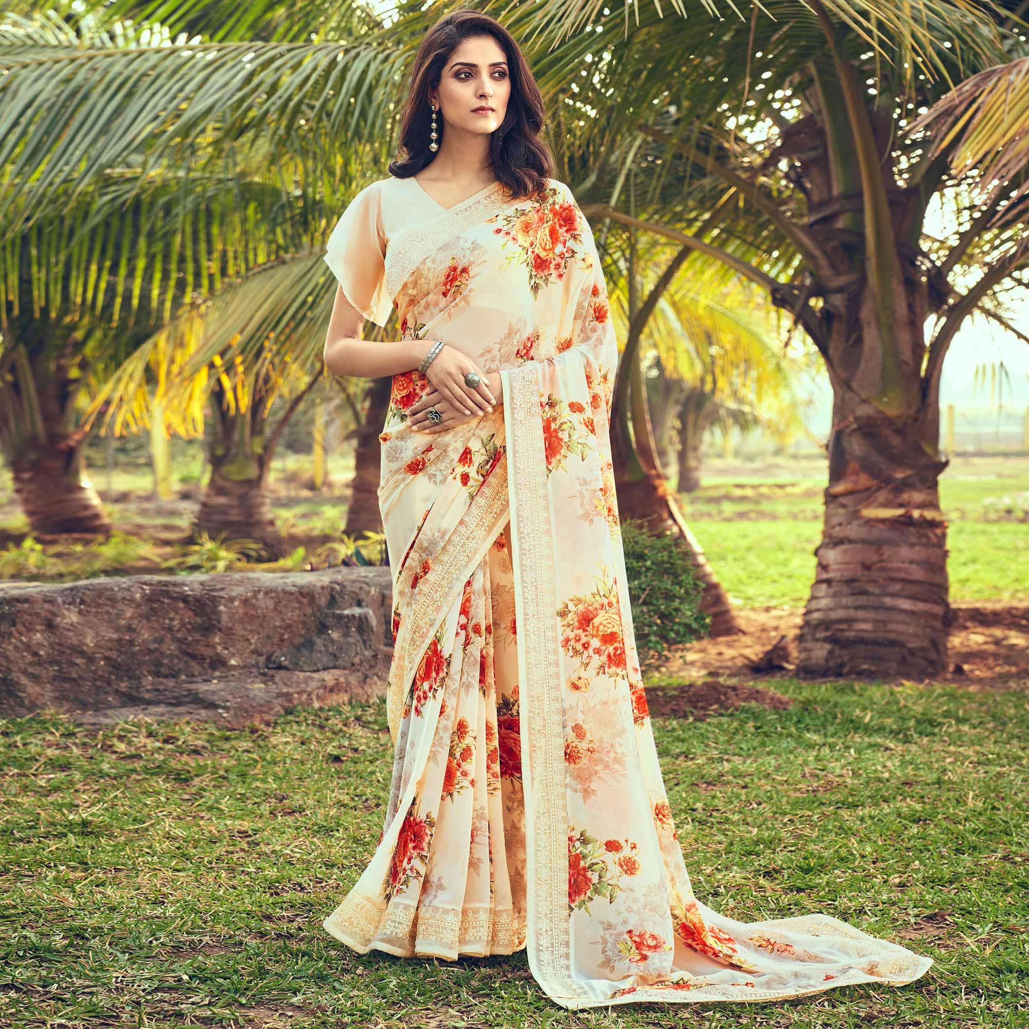 Cream Floral Printed With Embroidered Border Georgette Saree - Peachmode