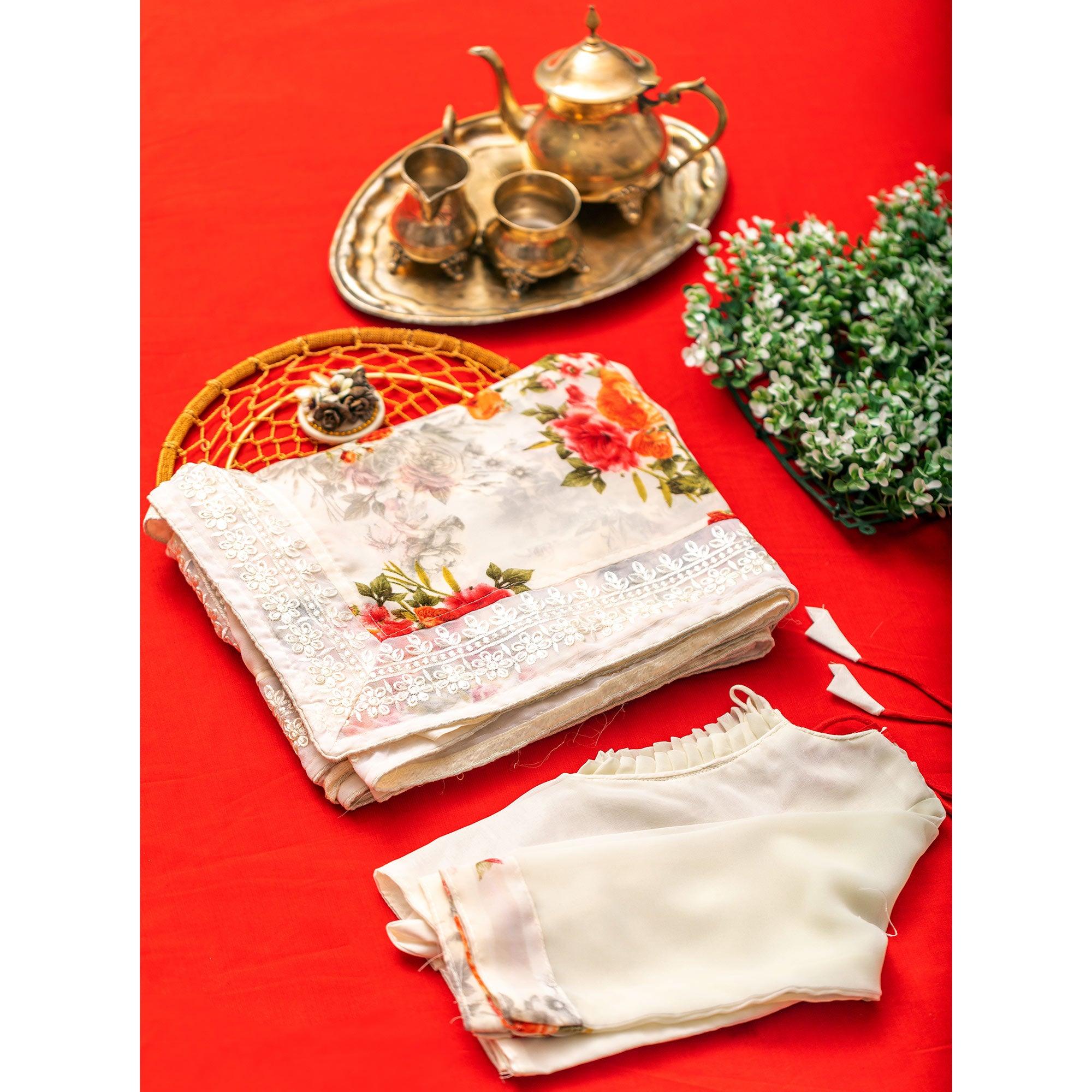 Cream Floral Printed With Embroidered Border Georgette Saree - Peachmode