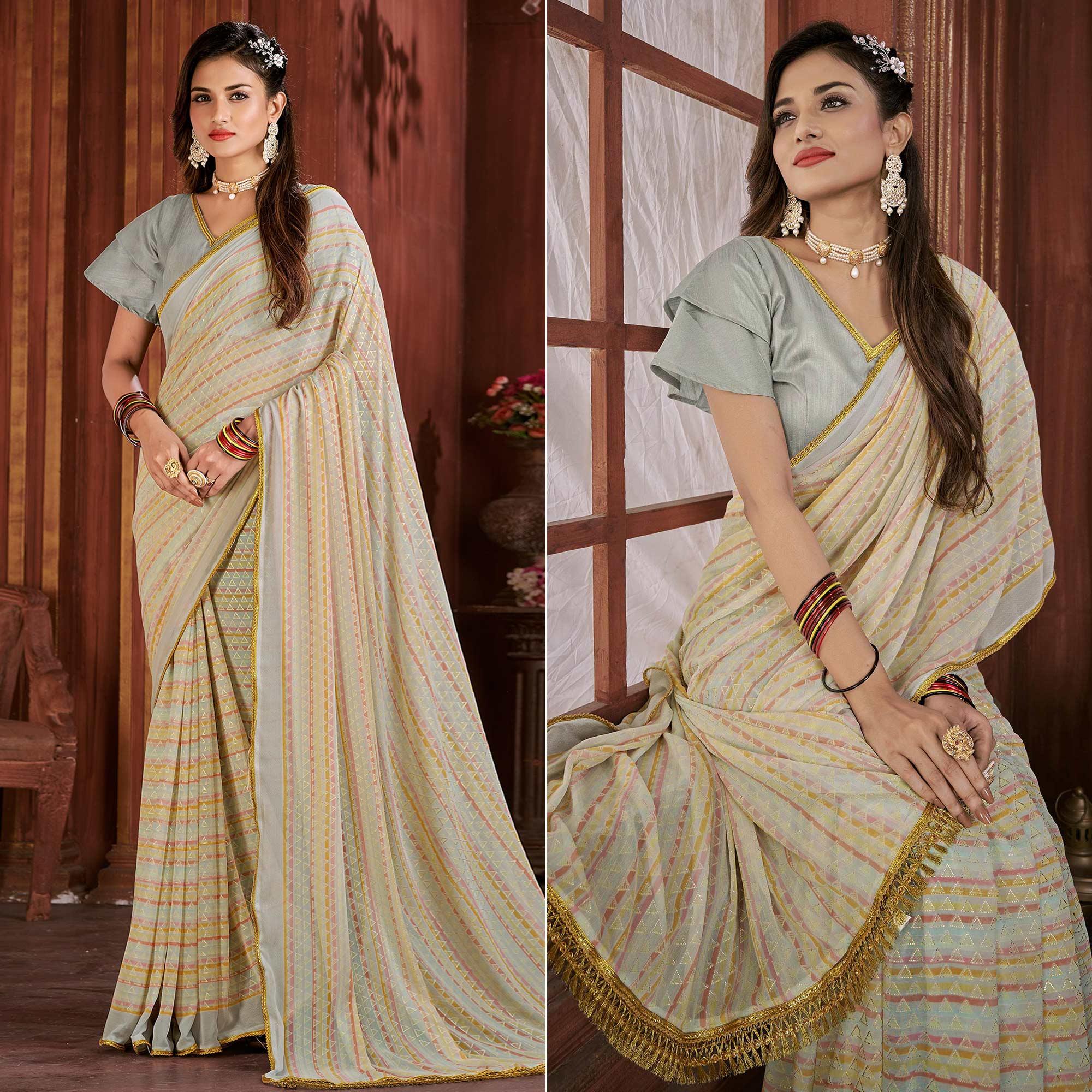 Cream Foil Printed Georgette Saree - Peachmode