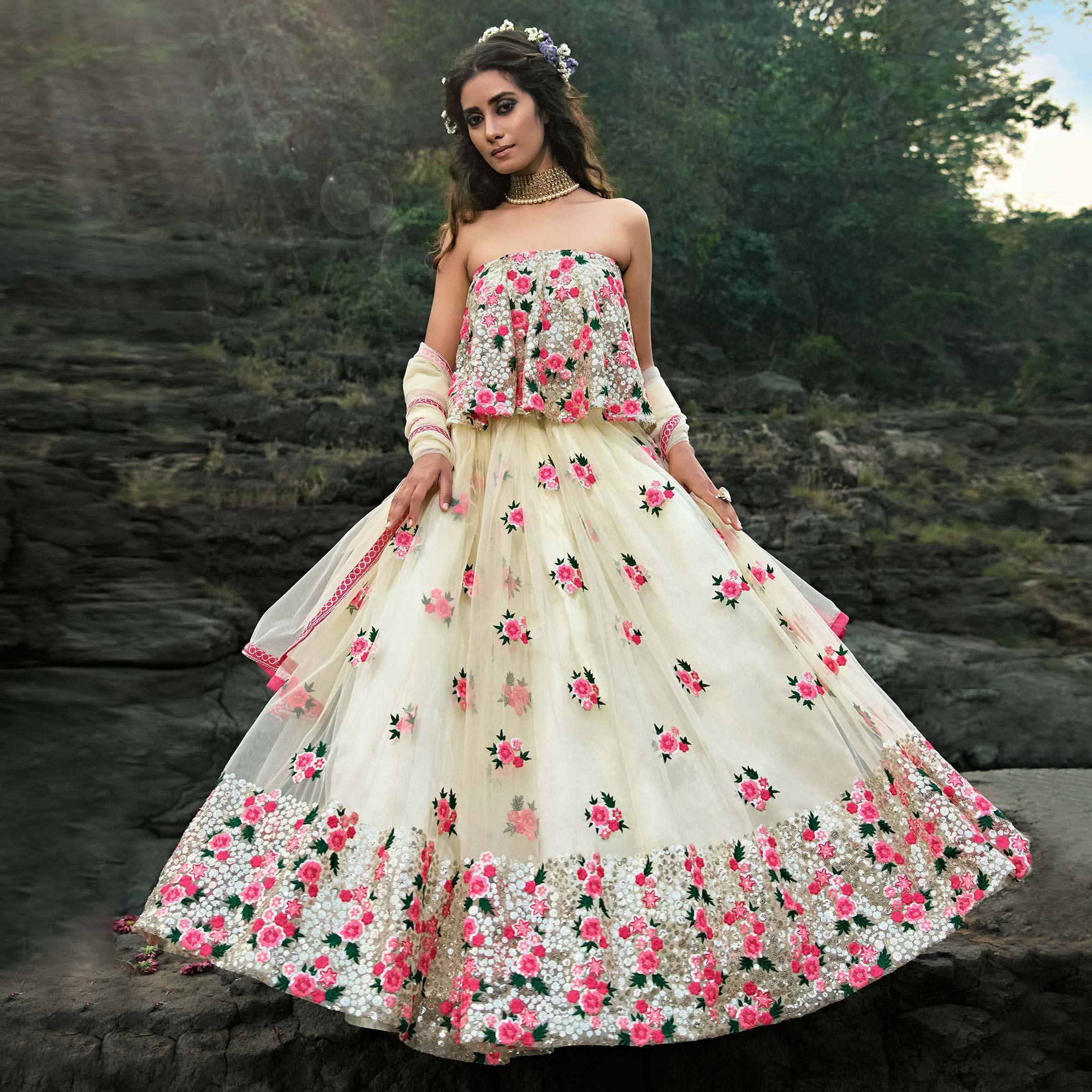 Cream Partywear Sequence Embroidered Soft Net Lehenga Choli - Peachmode