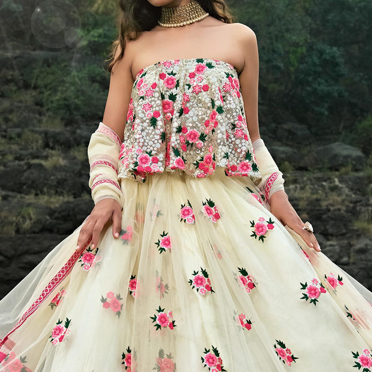 Cream Partywear Sequence Embroidered Soft Net Lehenga Choli - Peachmode
