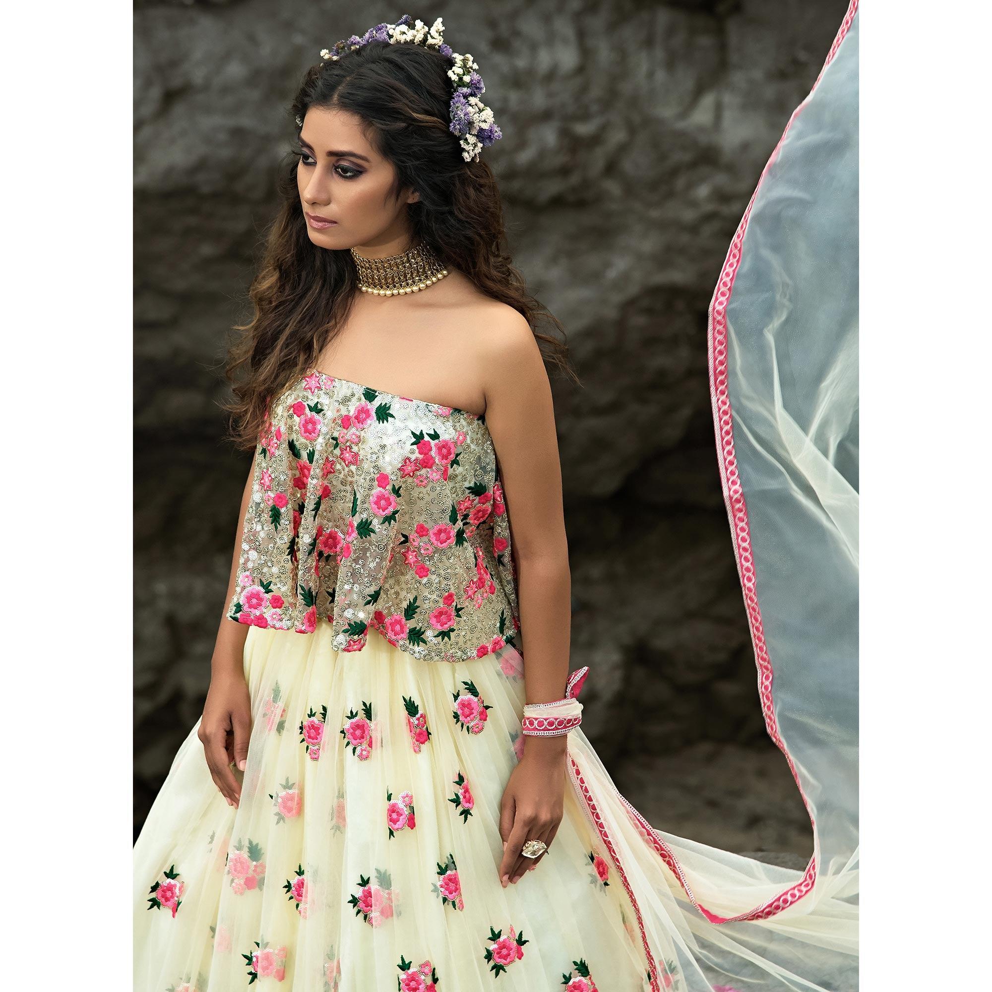 Cream Partywear Sequence Embroidered Soft Net Lehenga Choli - Peachmode