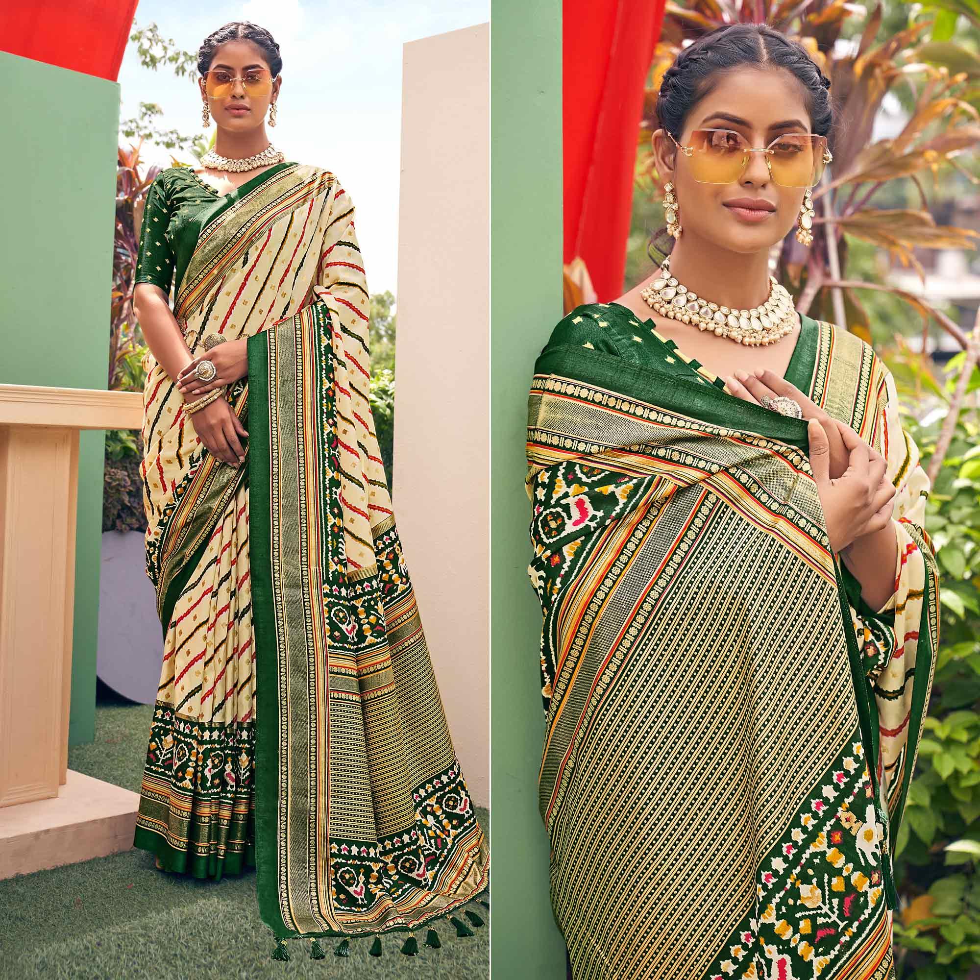 Cream Patola Printed Silk Saree With Tassels - Peachmode