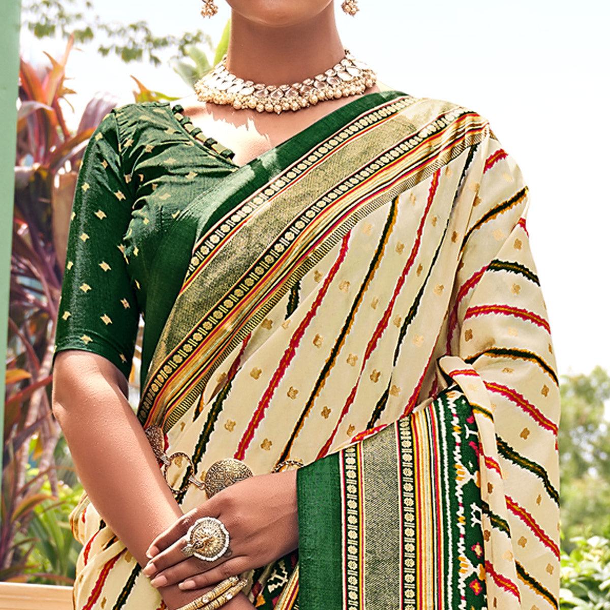 Cream Patola Printed Silk Saree With Tassels - Peachmode