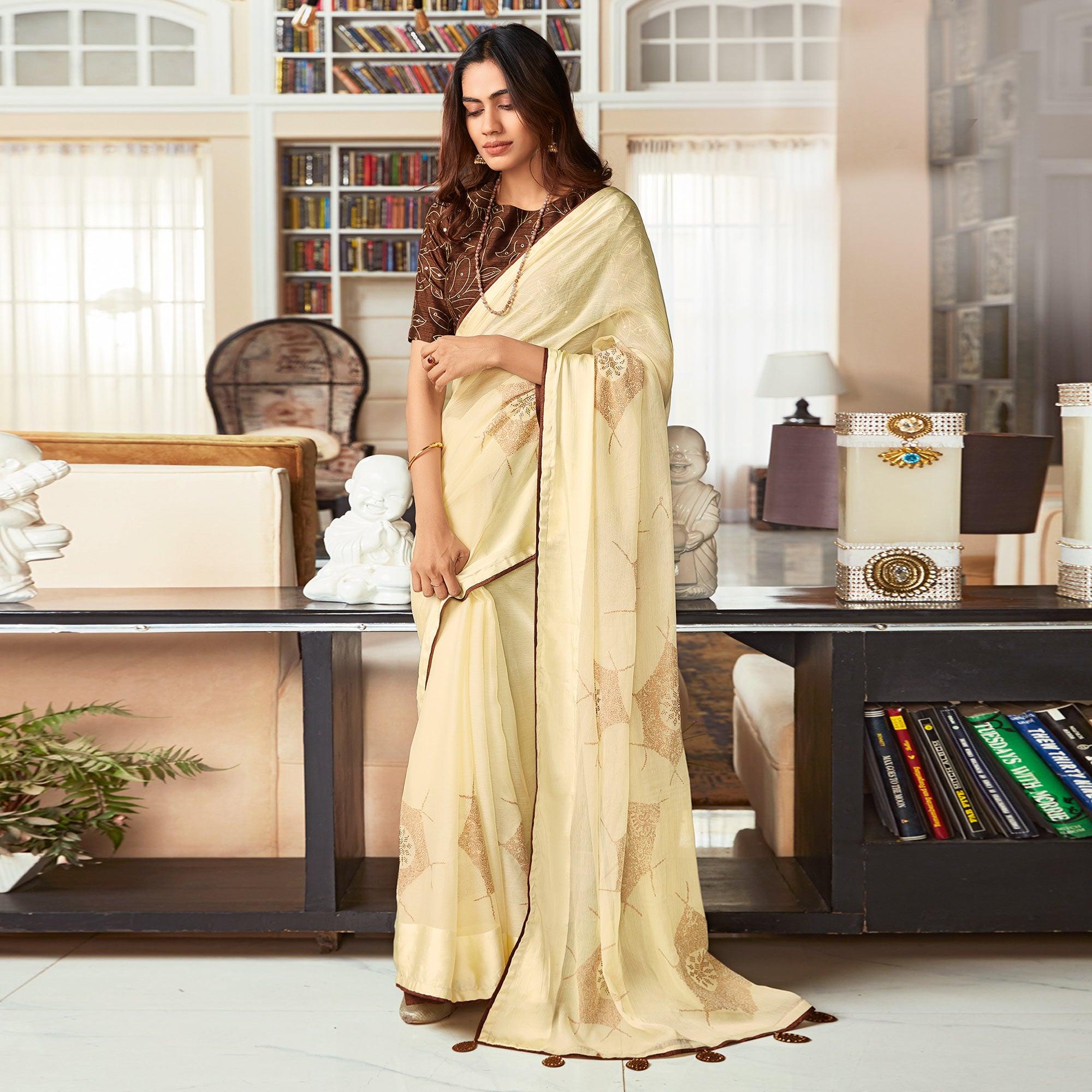 Cream Printed Art Silk Saree With Tassels - Peachmode