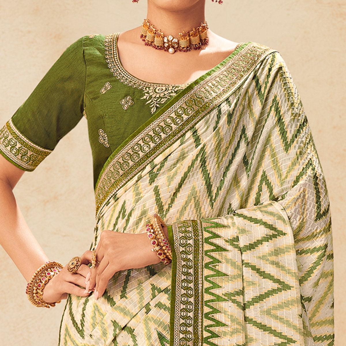 Cream Printed With Embellished Chiffon Saree With Tassels - Peachmode