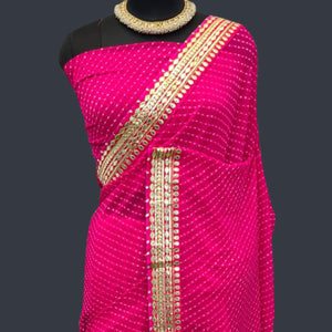 Dark Pink Printed Georgette Saree With Lace Border - Peachmode
