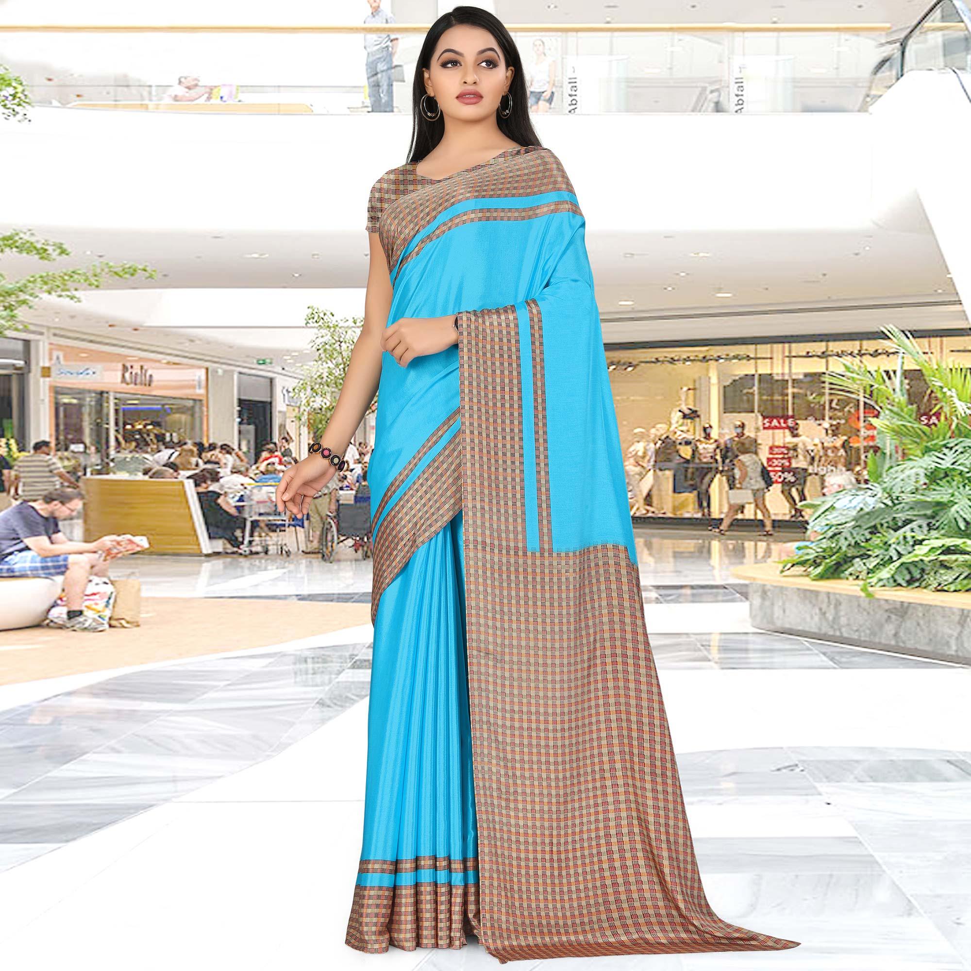 Dazzling Sky Blue Coloured Casual Wear Printed Crepe Saree - Peachmode