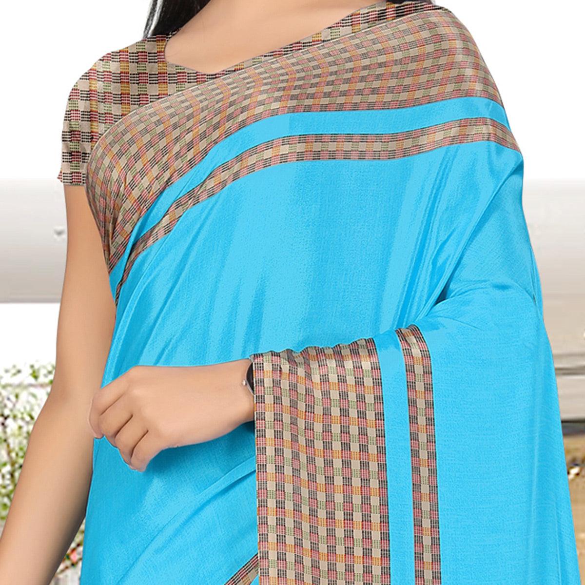 Dazzling Sky Blue Coloured Casual Wear Printed Crepe Saree - Peachmode