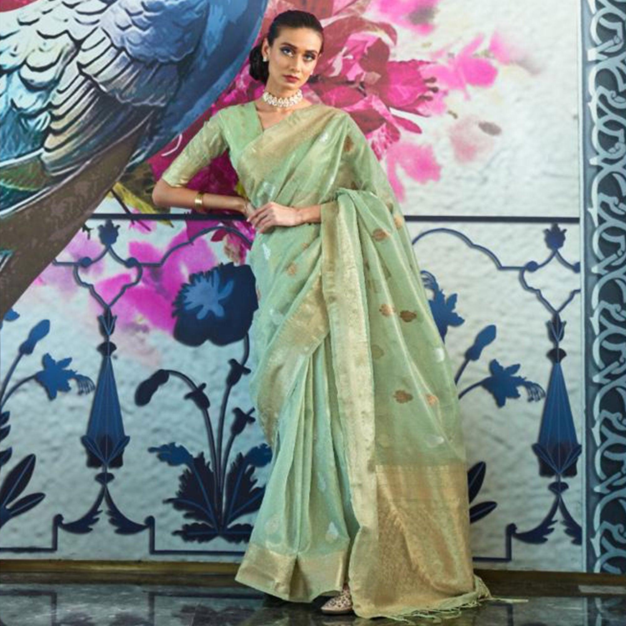 Dazzling Turquoise Coloured Partywear Organza weaving Saree - Peachmode