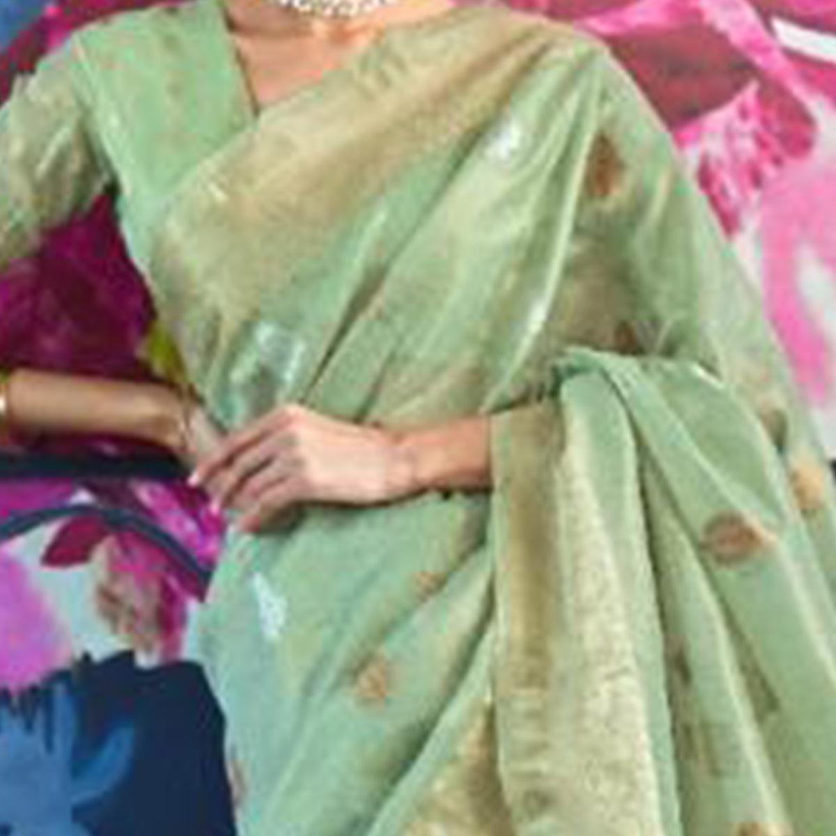 Dazzling Turquoise Coloured Partywear Organza weaving Saree - Peachmode
