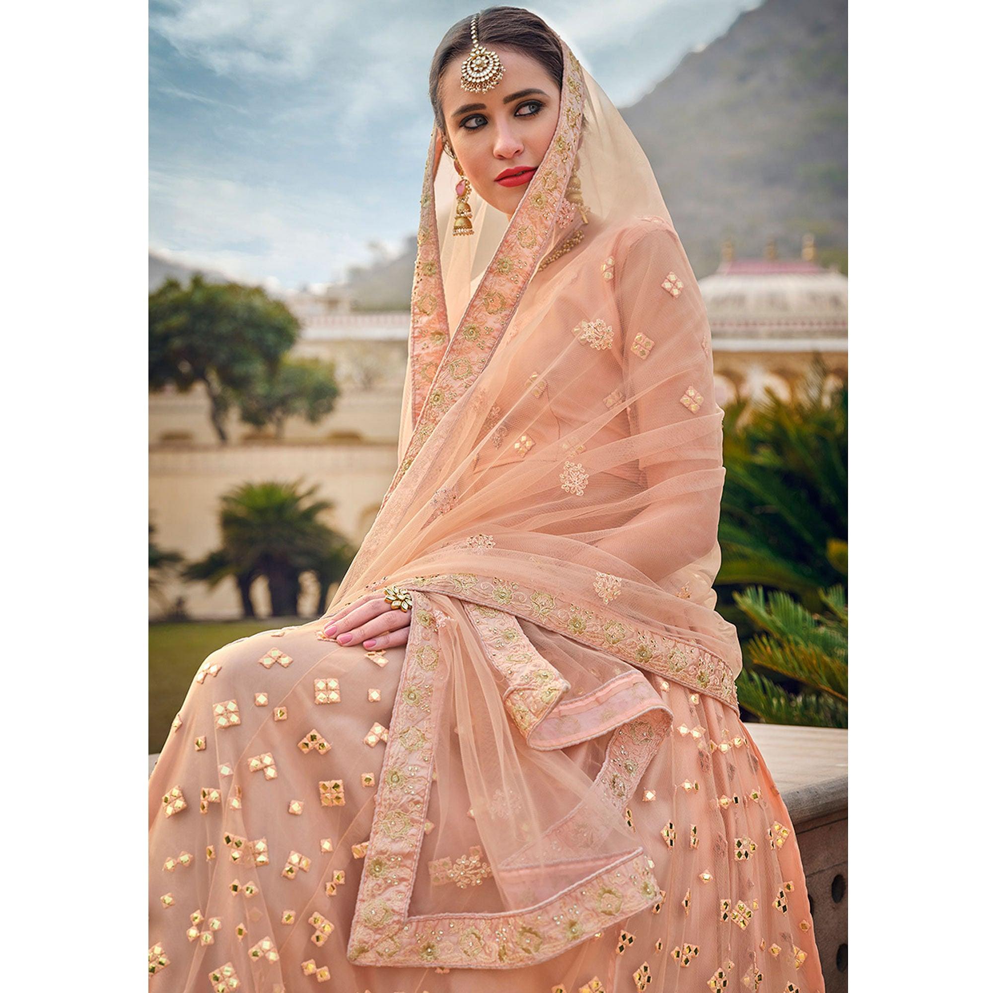 Deep Peach Embellished & Embroidered Net Lehenga Choli - Peachmode