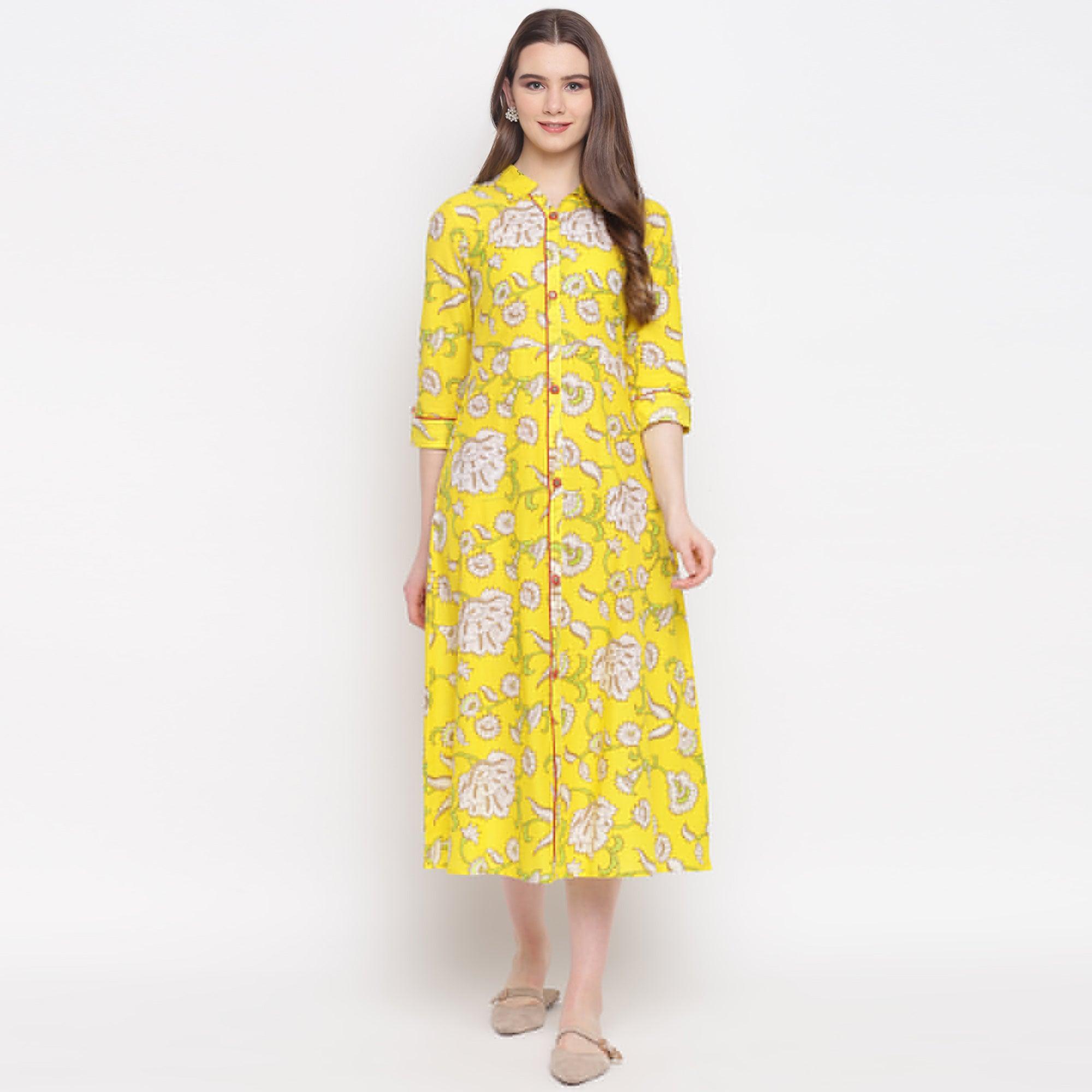 Delightful Lemon Yellow Colored Casual Wear Printed A-Line Calf Length Cambric Kurti - Peachmode