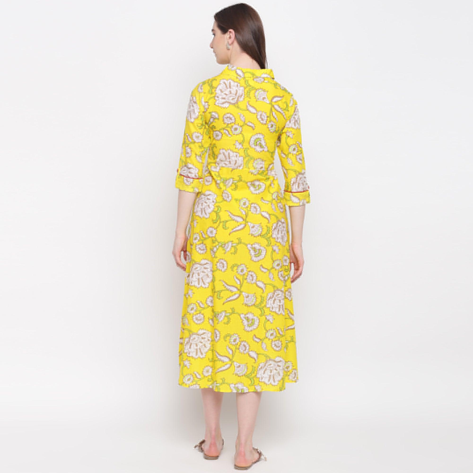 Delightful Lemon Yellow Colored Casual Wear Printed A-Line Calf Length Cambric Kurti - Peachmode