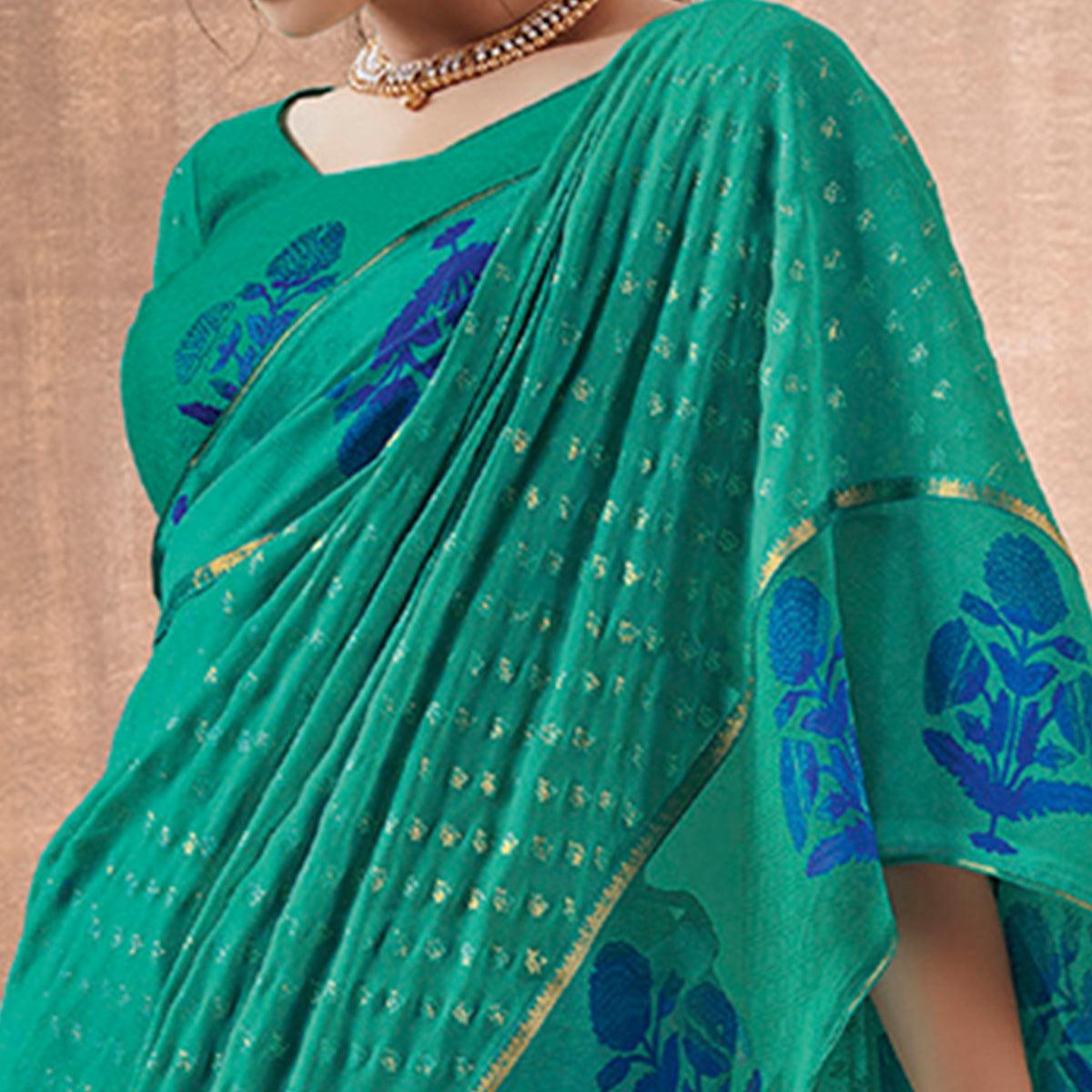 Delightful Rama Green Colored Festive Wear Foil Printed Georgette Saree - Peachmode