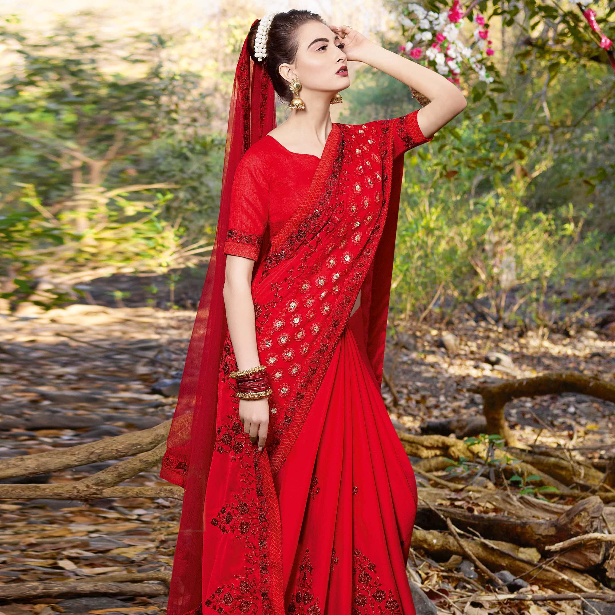 Delightful Red Colored Partywear Embroidered Georgette Saree - Peachmode