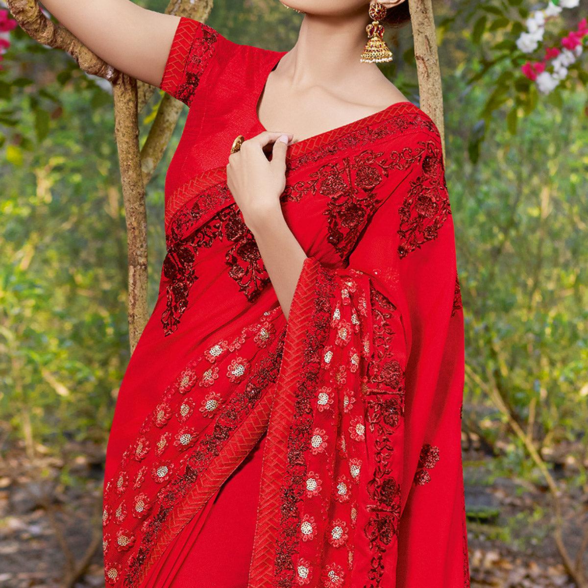 Delightful Red Colored Partywear Embroidered Georgette Saree - Peachmode