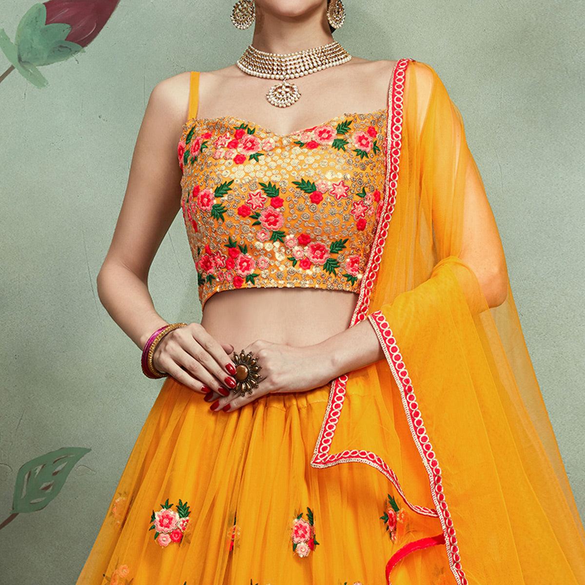 Demanding Mustard Yellow Colored Partywear Embroidered Netted Lehenga - Peachmode
