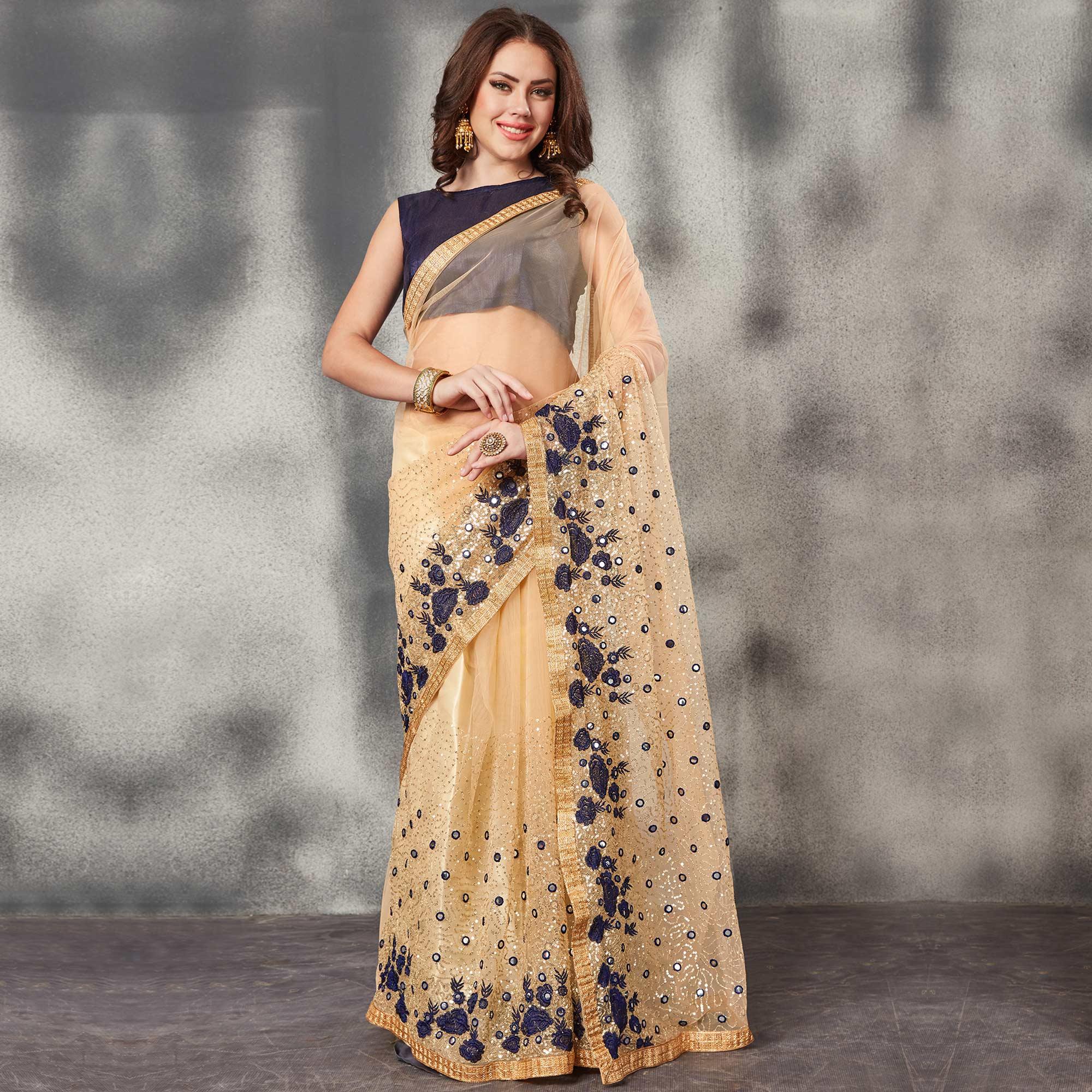 Desirable Beige Navy Blue Colored Partywear Embroidered Netted Saree - Peachmode