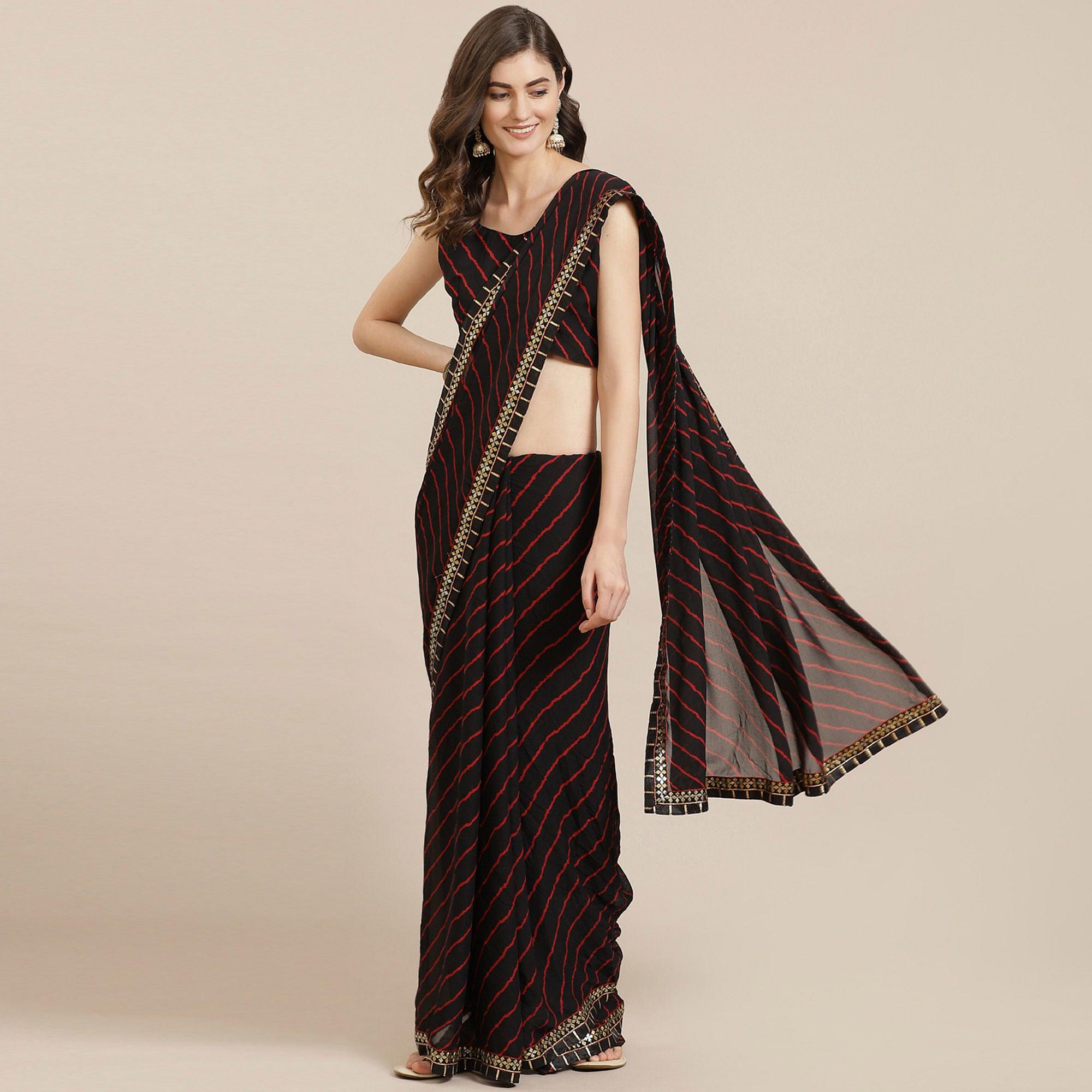 Desirable Black Coloured Partywear Printed Georgette Saree - Peachmode