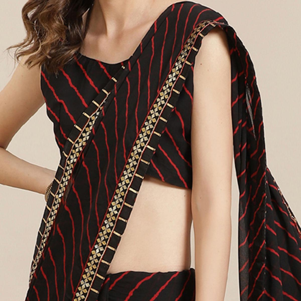Desirable Black Coloured Partywear Printed Georgette Saree - Peachmode