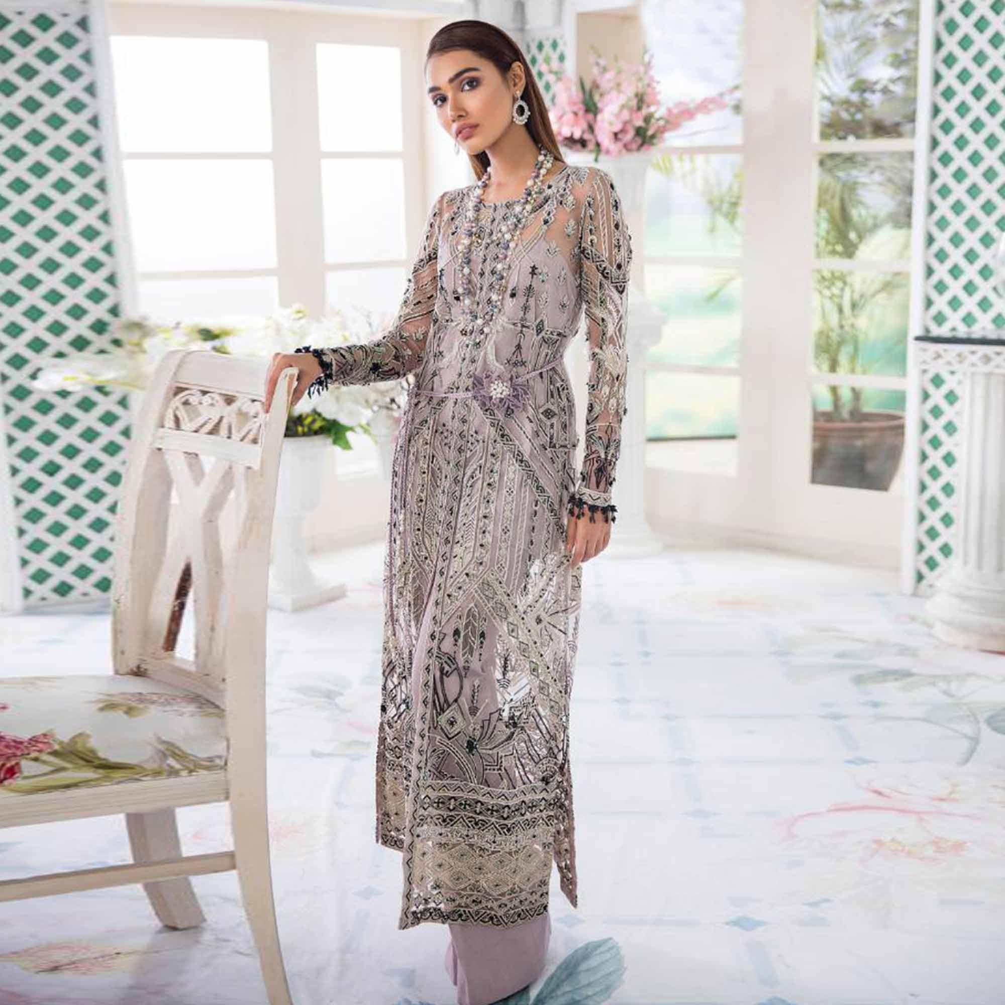 Desirable Pastel Purple Colored Party Wear Embroidered Net Palazzo Suit - Peachmode