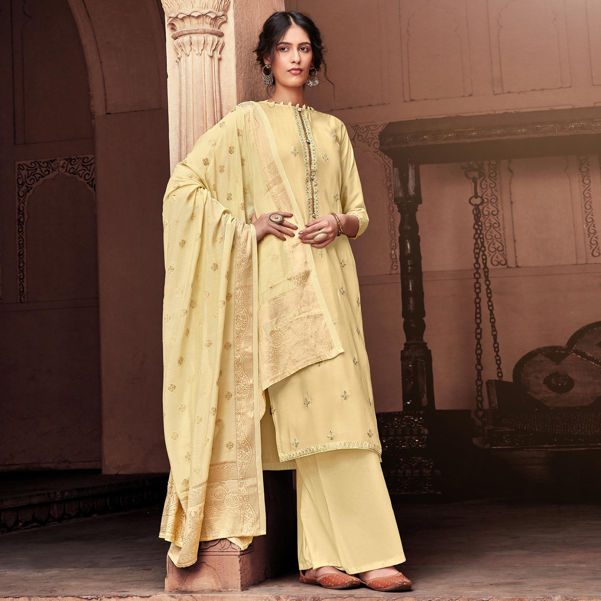 Elegant Cream Colored Partywear Embroidered Viscose Muslin Palazzo Suit - Peachmode