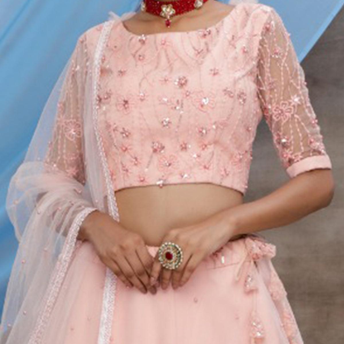 Elegant Peach Colored Party Wear Embroidered Net Lehenga Choli - Peachmode